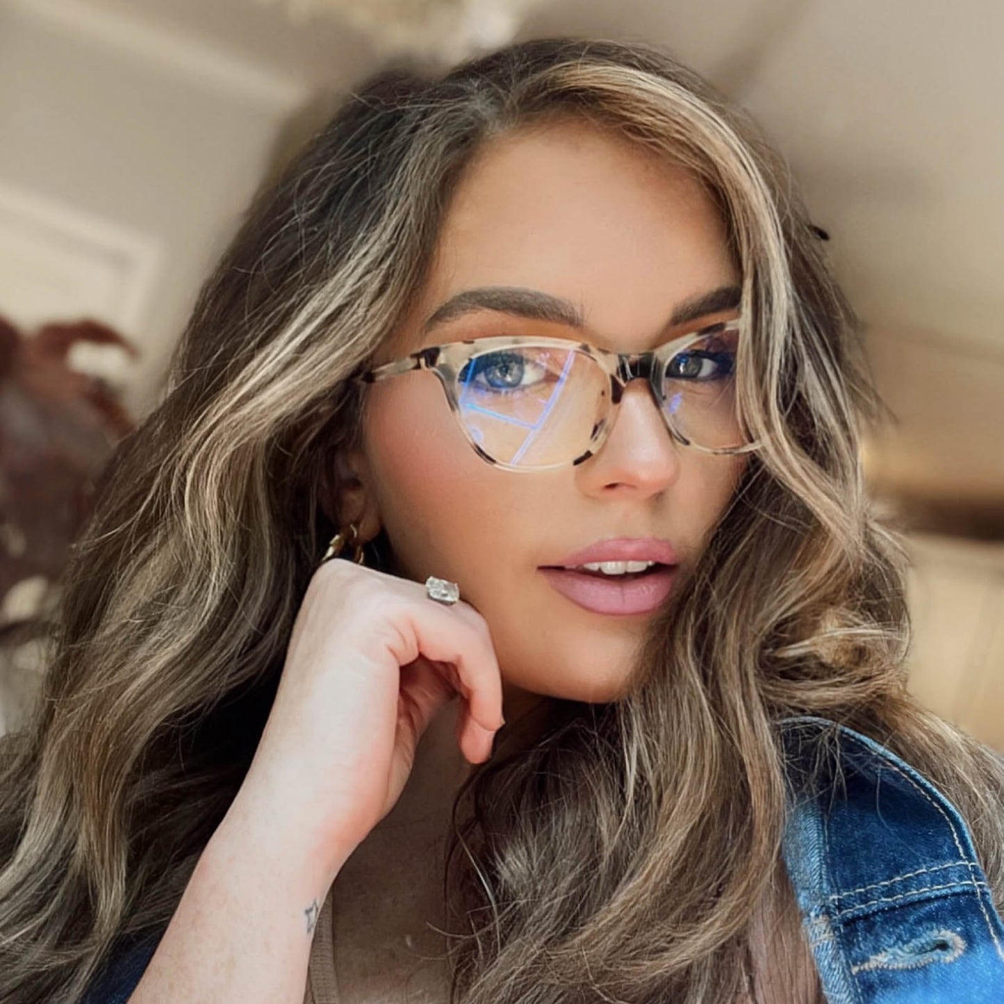 lifestyle - leasims wearing diff eyewear jade glasses with a cream tortoise frame and blue light technology lenses