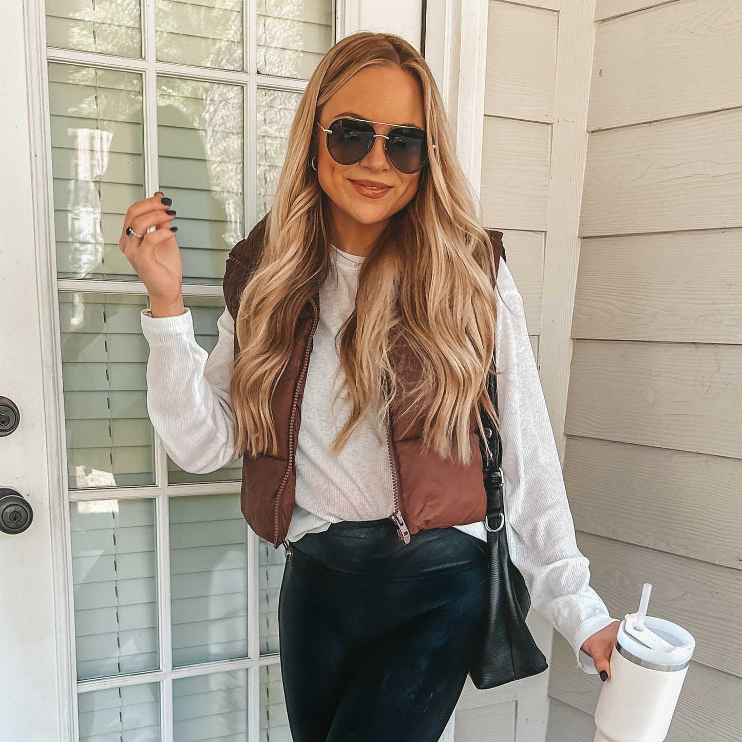 customer content - kimberlyj king wearing diff eyewear lenox aviator sunglasses with a gold, black metal frame and grey gradient polarized lenses