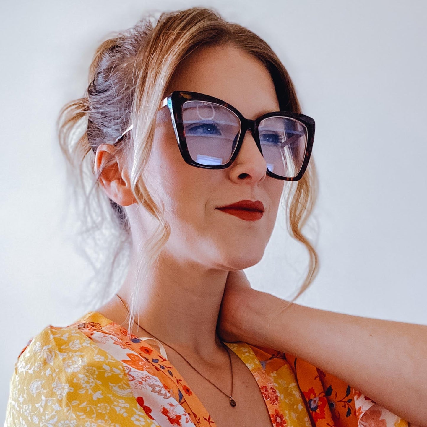 customer content - little warrior wearing becky iv amber tortoise with blue light glasses