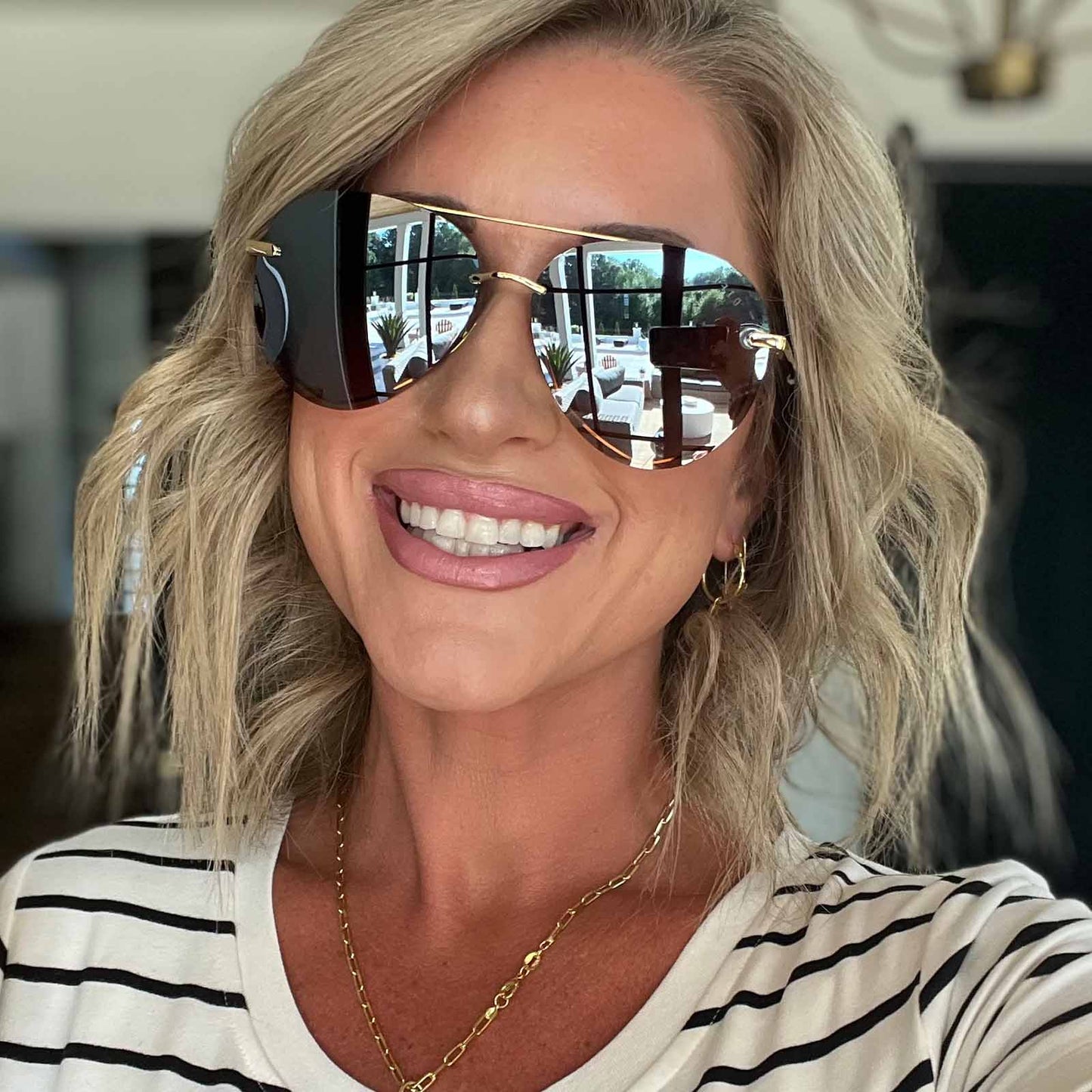 customer content - female wearing diff eyewear lenox aviator sunglasses with a gold frame and brown gradient mirror polarized lenses