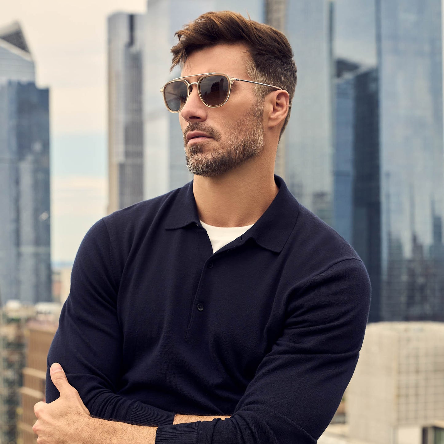 on model - male while looking away from the camera wearing diff eyewear camden aviator sunglasses with a vintage crystal frame and brown gradient polarized lenses