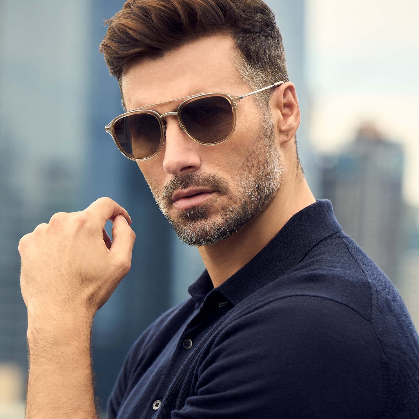 on model - male while gazing at the camera wearing diff eyewear camden aviator sunglasses with a vintage crystal frame and brown gradient polarized lenses