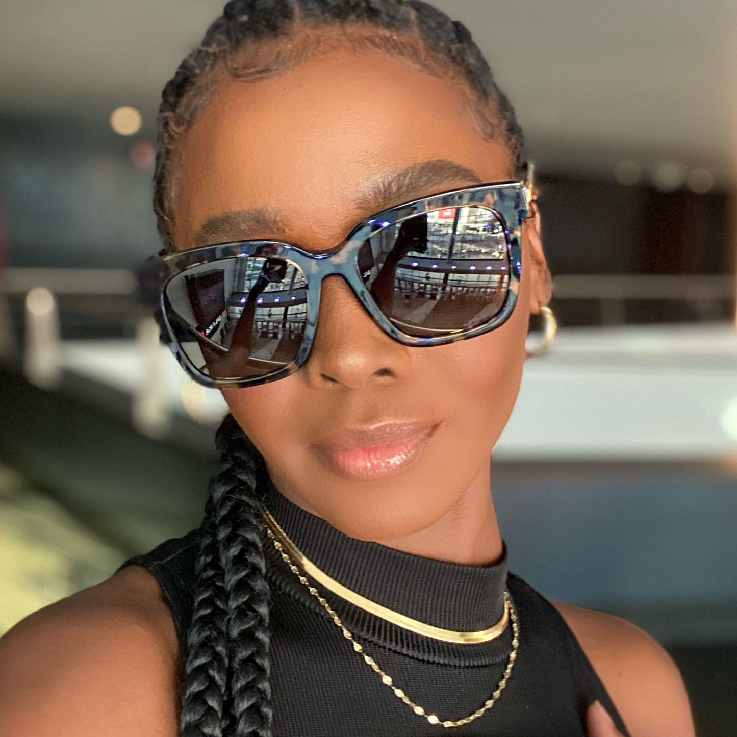 customer content - female wearing bella espresso tortoise acetate frame and grey lenses
