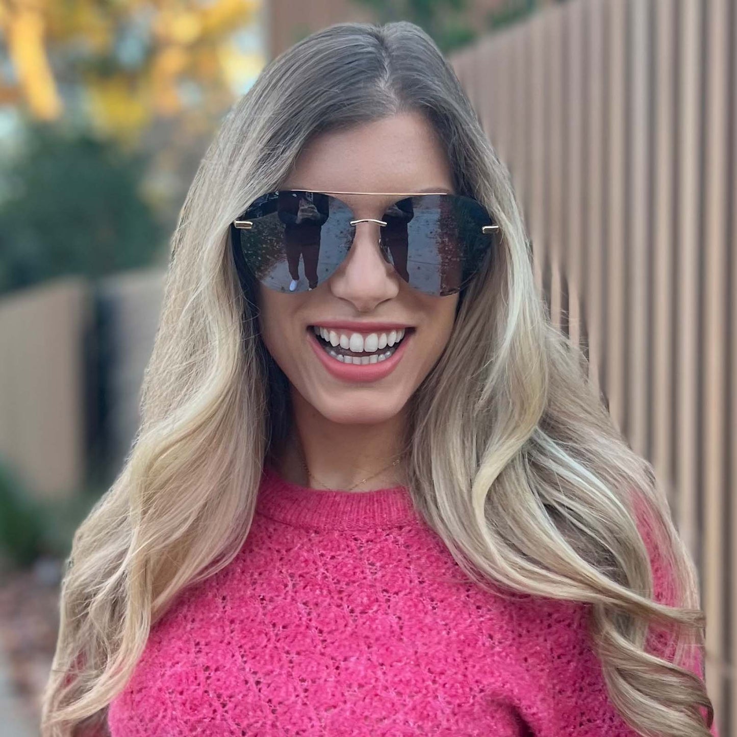 customer content - blonde female outdoors wearing diff eyewear lenox aviator sunglasses with a gold metal frame and brown gradient mirror polarized lenses
