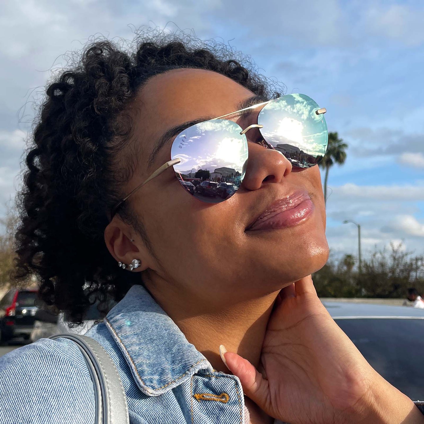 customer content - female wearing lenox brushed gold cherry blossom mirror sunglasses
