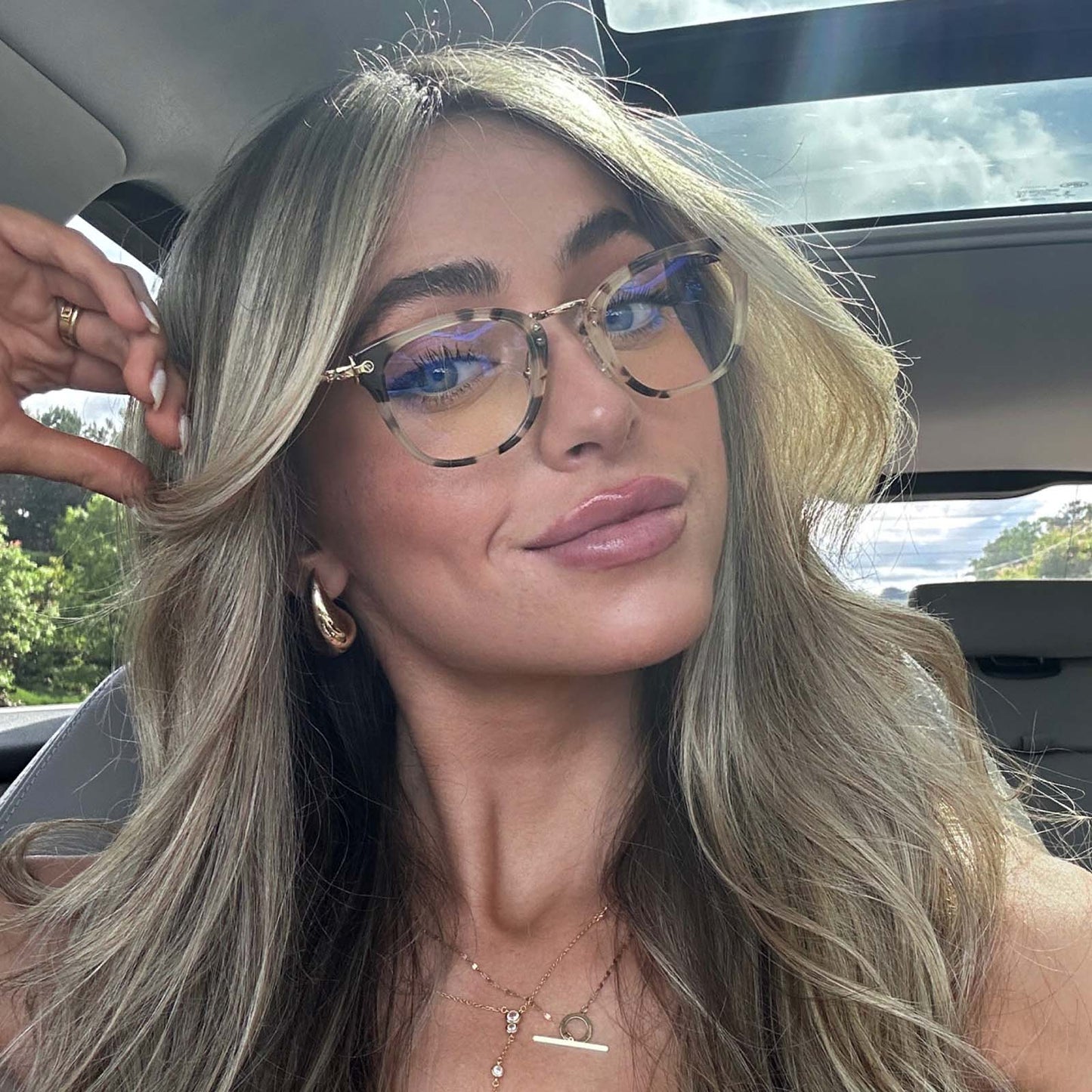 customer content - blonde female wearing diff eyewear rue square glasses with a cream tortoise frame and blue light technology lenses