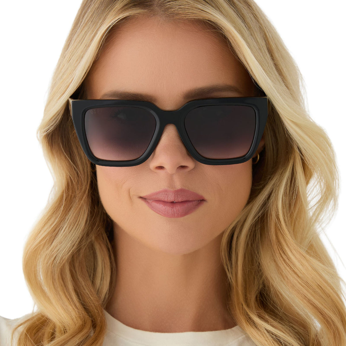 on model - female wearing diff eyewear featuring the amara square sunglasses with a black frame and grey gradient lenses front view