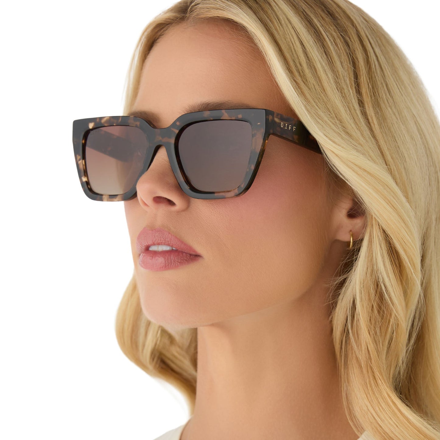 on model - female wearing diff eyewear featuring the amara square sunglasses with a dark cherry lacquer frame and grey gradient lenses angled view