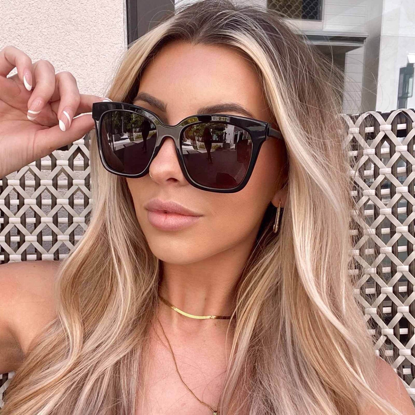 customer content - blonde model wearing bella black + grey womens oversized square polarized sunglasses