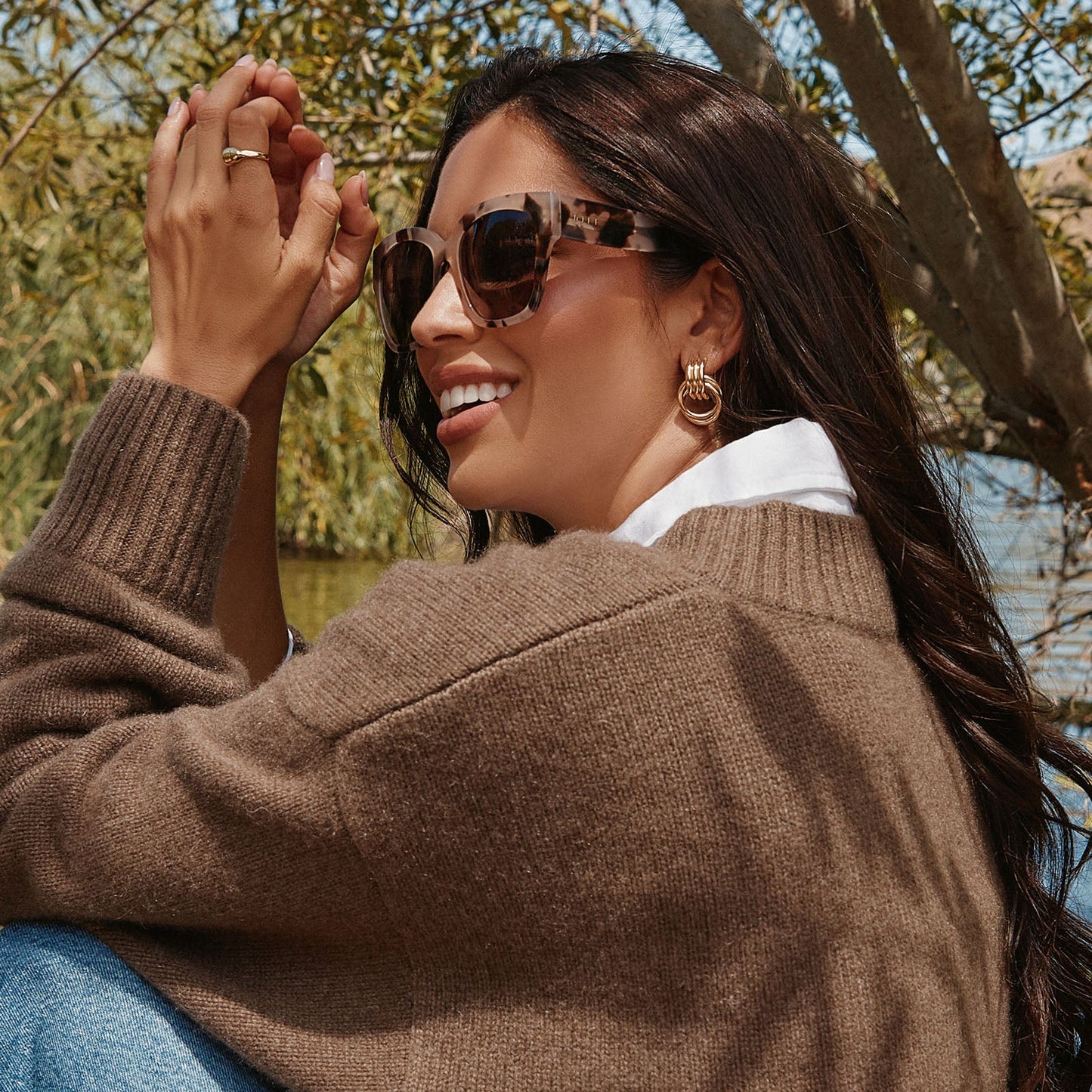 on model - female wearing Bella II sunglasses in with cream tortoise frames and grey gradient lens side view
