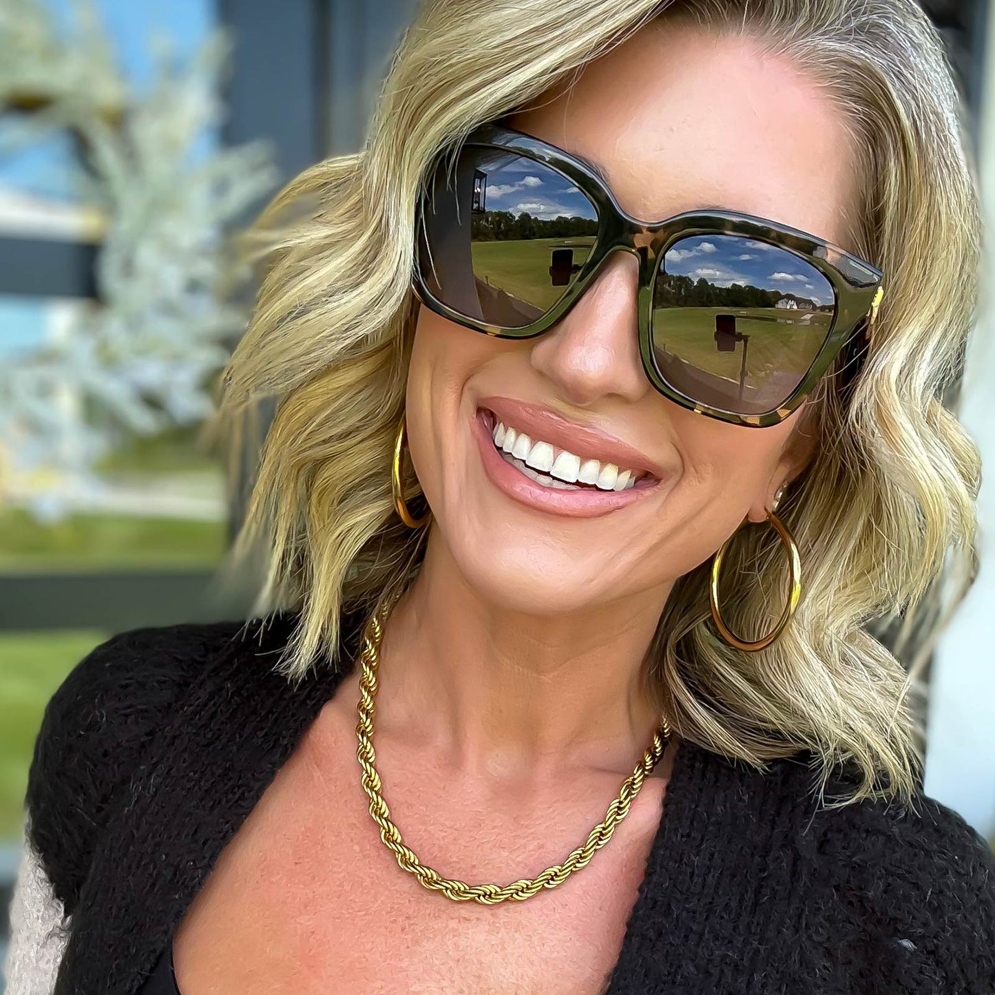 lifestyle - kalee rogeres wearing diff eyewear bella square sunglasses with espresso tortoise frame and grey gradient polarized lenses
