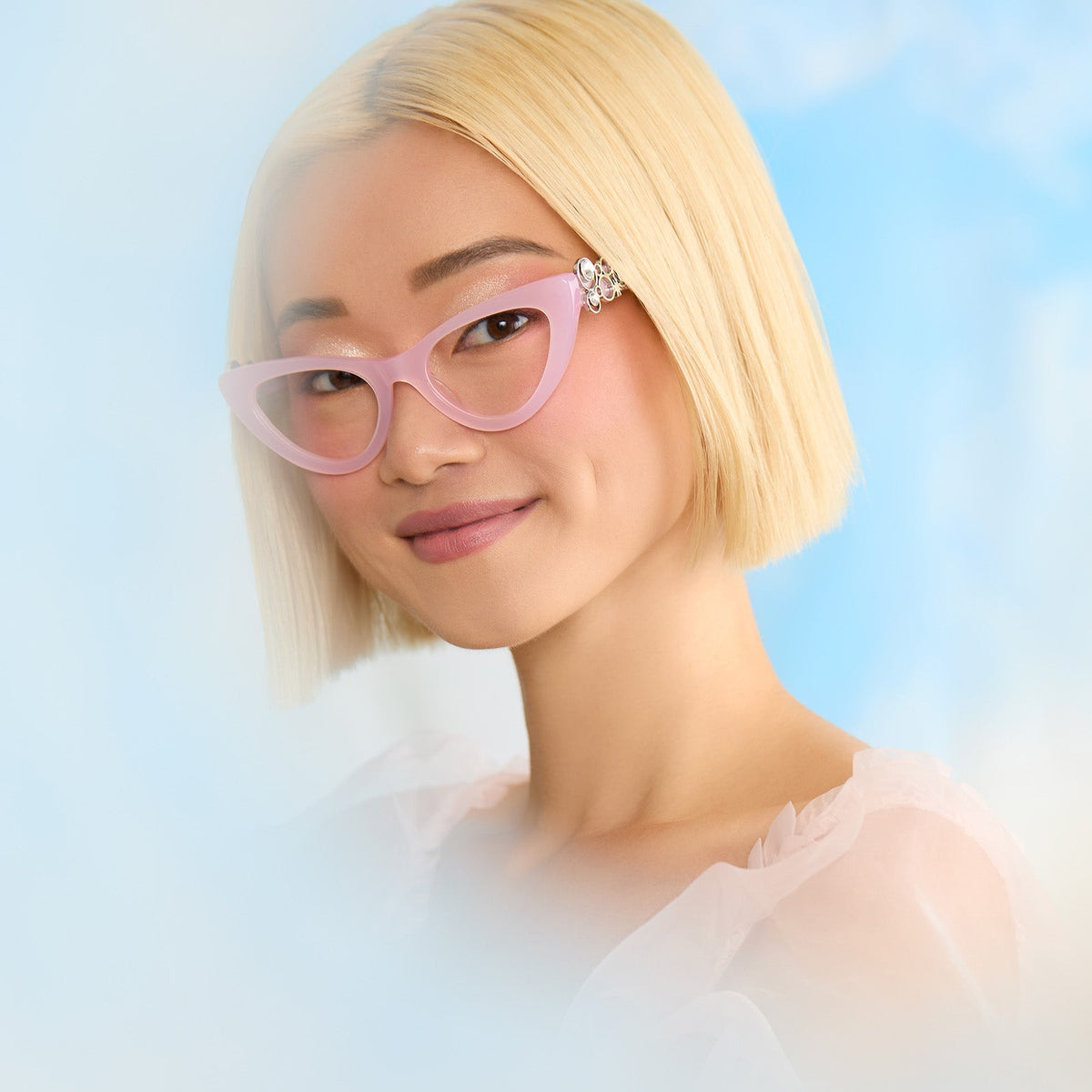 on model - female wearing wicked x diff eyewear featuring the glinda upland for good cat eye prescription glasses with a pink frame front view