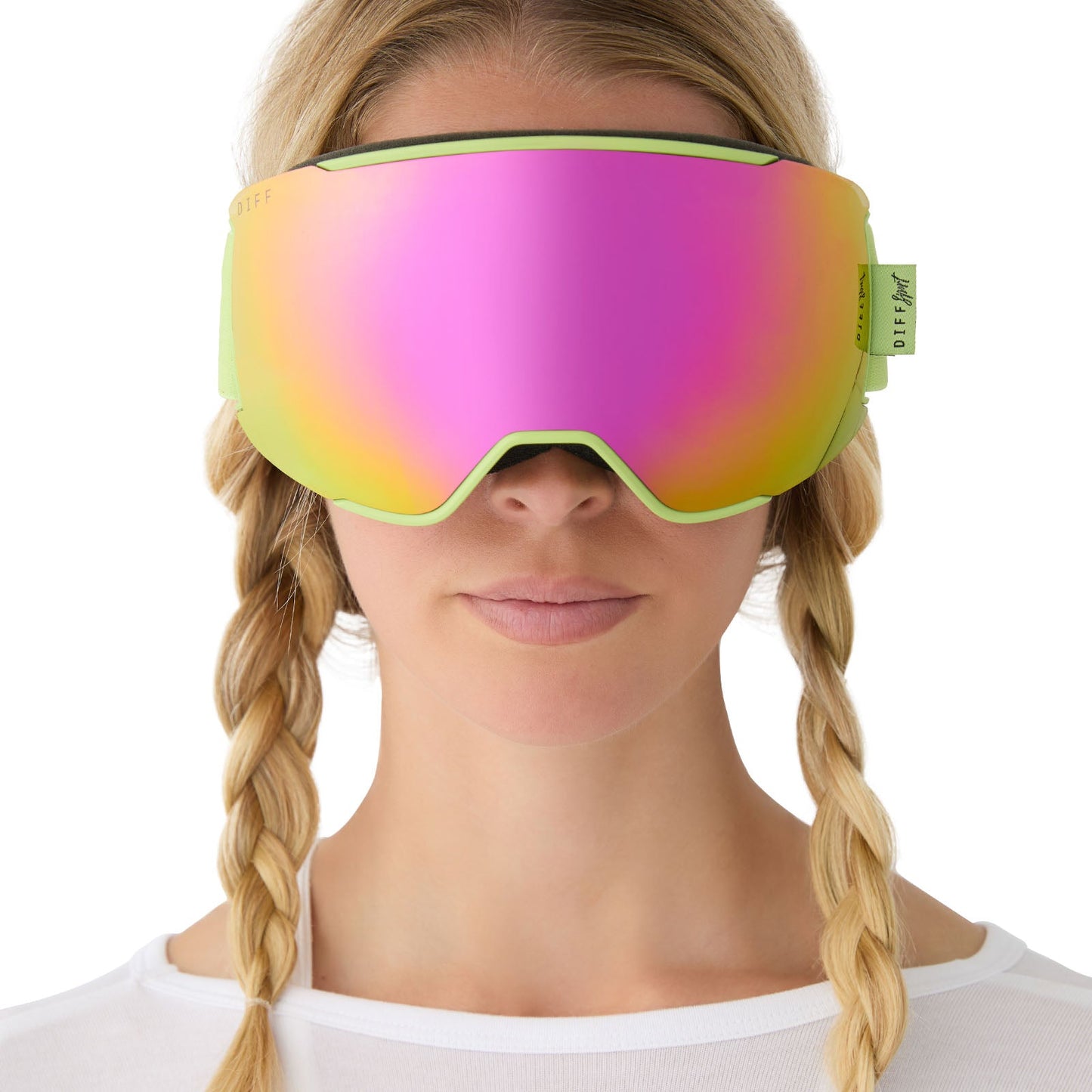 on model - female wearing lifestyle - female wearing diff sport alpine goggles in lime green with hot pink mirror polarized lens front view