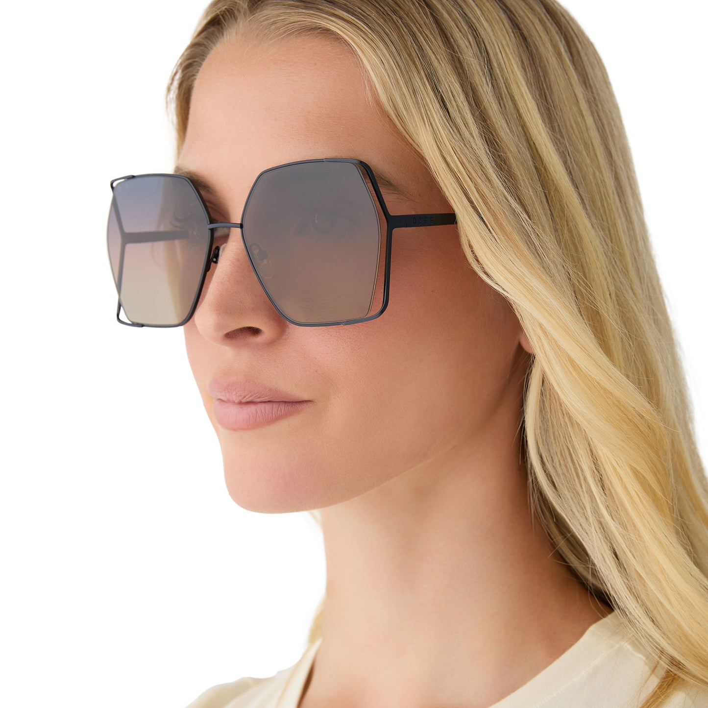 on model - female wearing diff eyewear featuring the donna iv square sunglasses with a black frame and twilight gradient polarized lenses side view