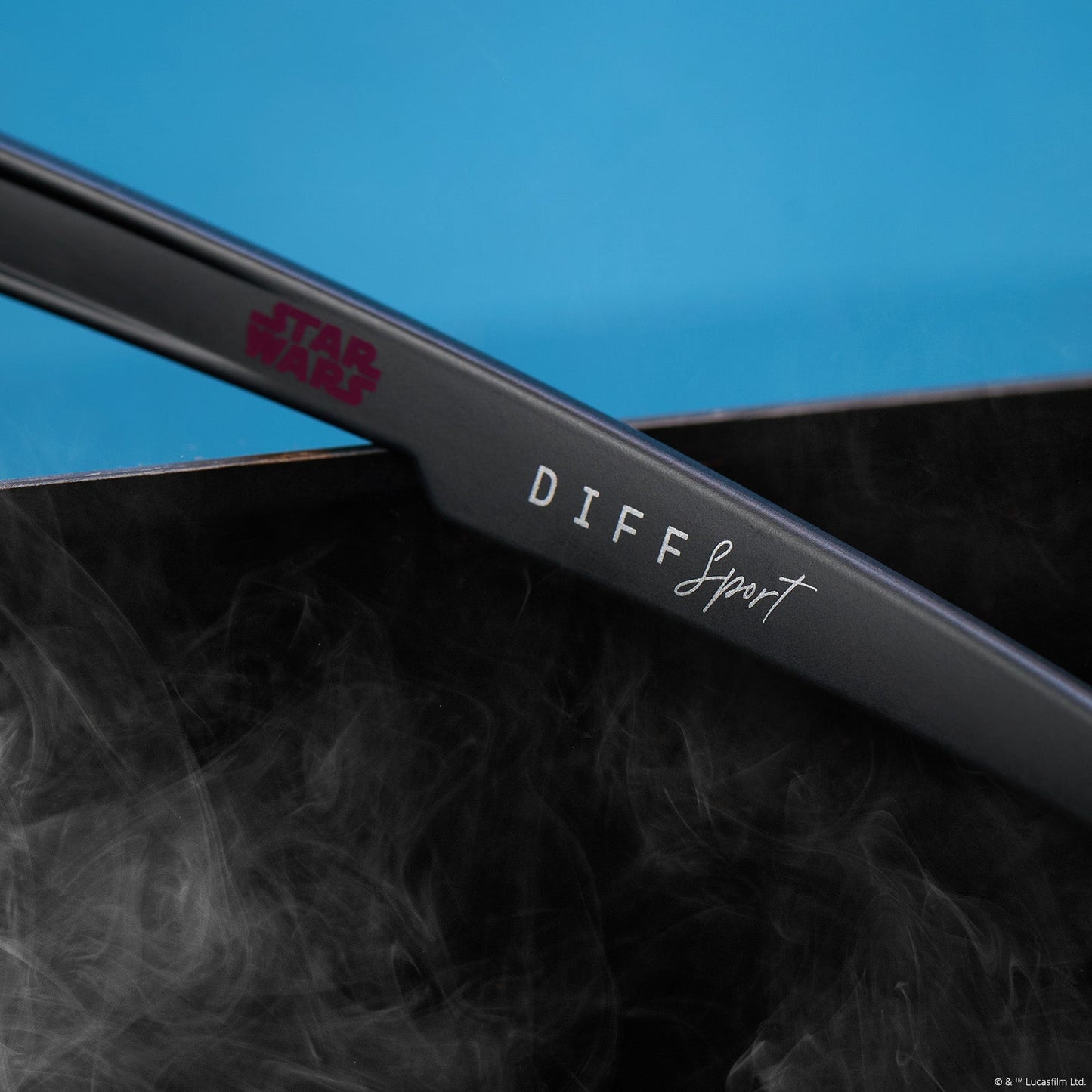 lifestyle - star wars™ x diff sport featuring the darth vader™ 4.0 shield sunglasses with a dark glossy black frame and black grey polarized lenses detailed view of temple leg