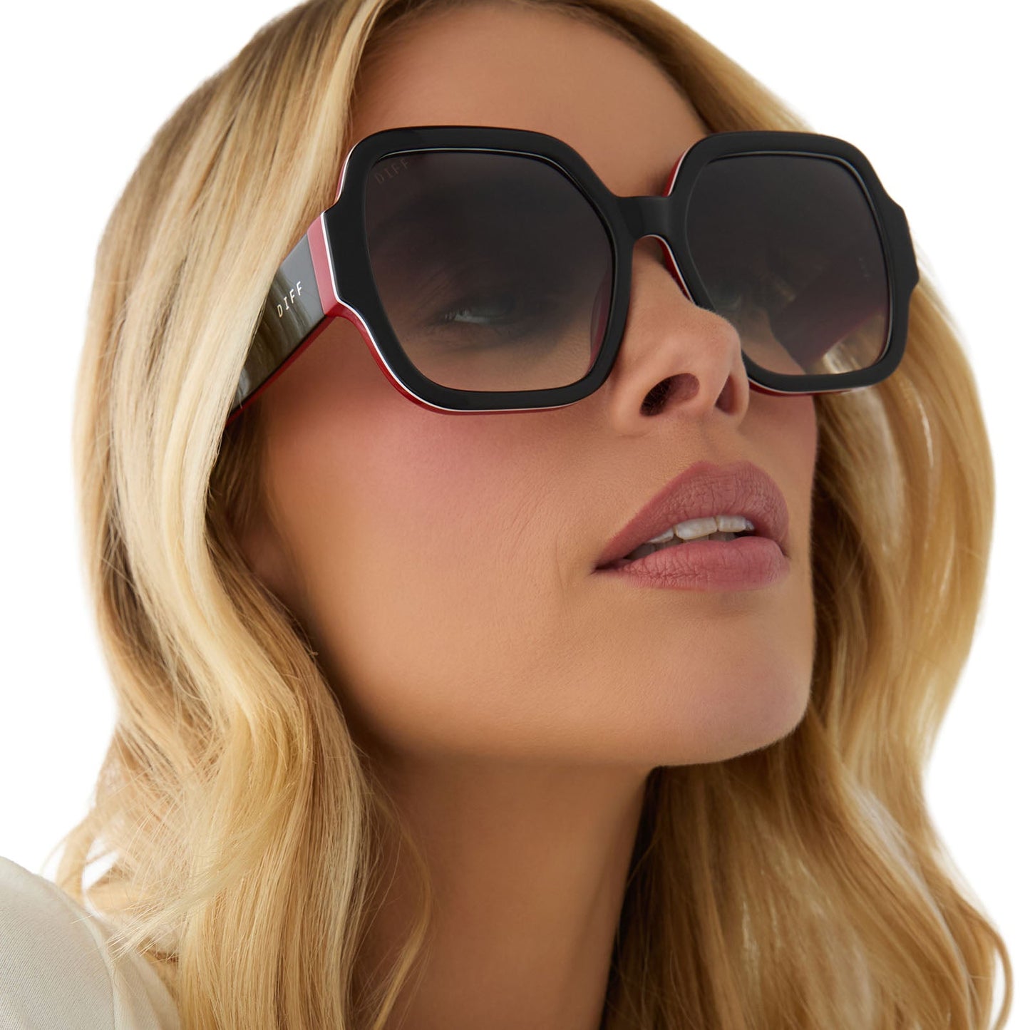 on model - female wearing clueless x diff eyewear featuring the dionne square sunglasses with a black frame and grey gradient lenses detailed view