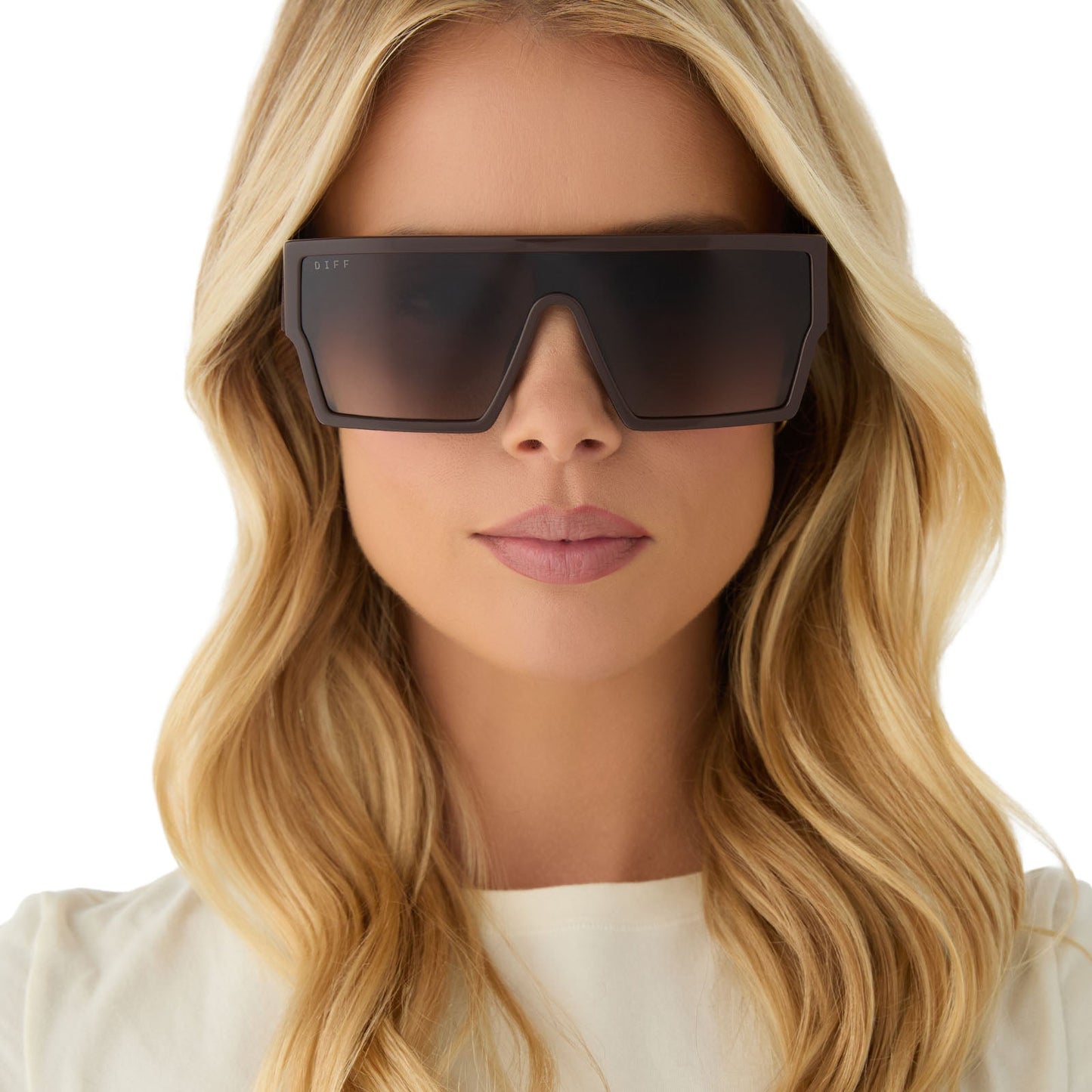 on model - female wearing diff eyewear featuring the electra shield sunglasses with a truffle frame and truffle gradient lenses front view