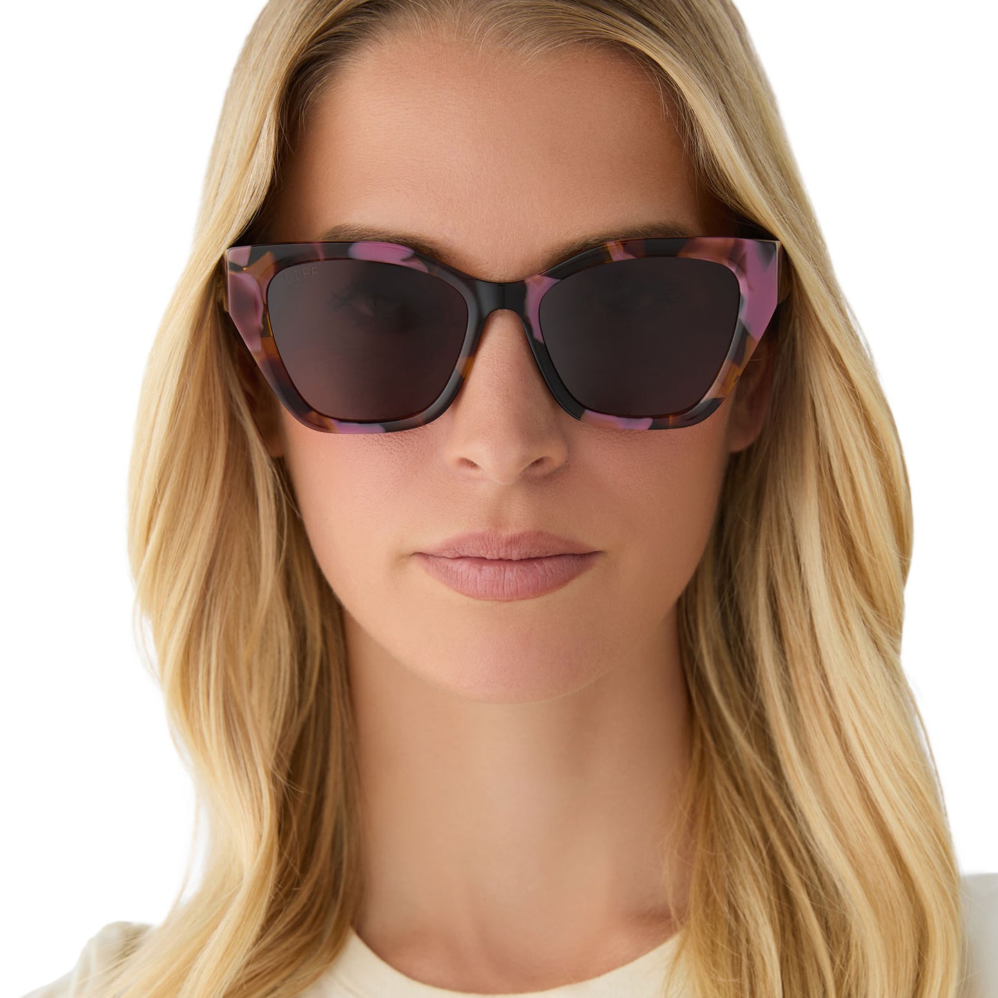 on model - female wearing diff eyewear featuring the evie cat eye sunglasses with a torino tortoise frame and brown lenses front view