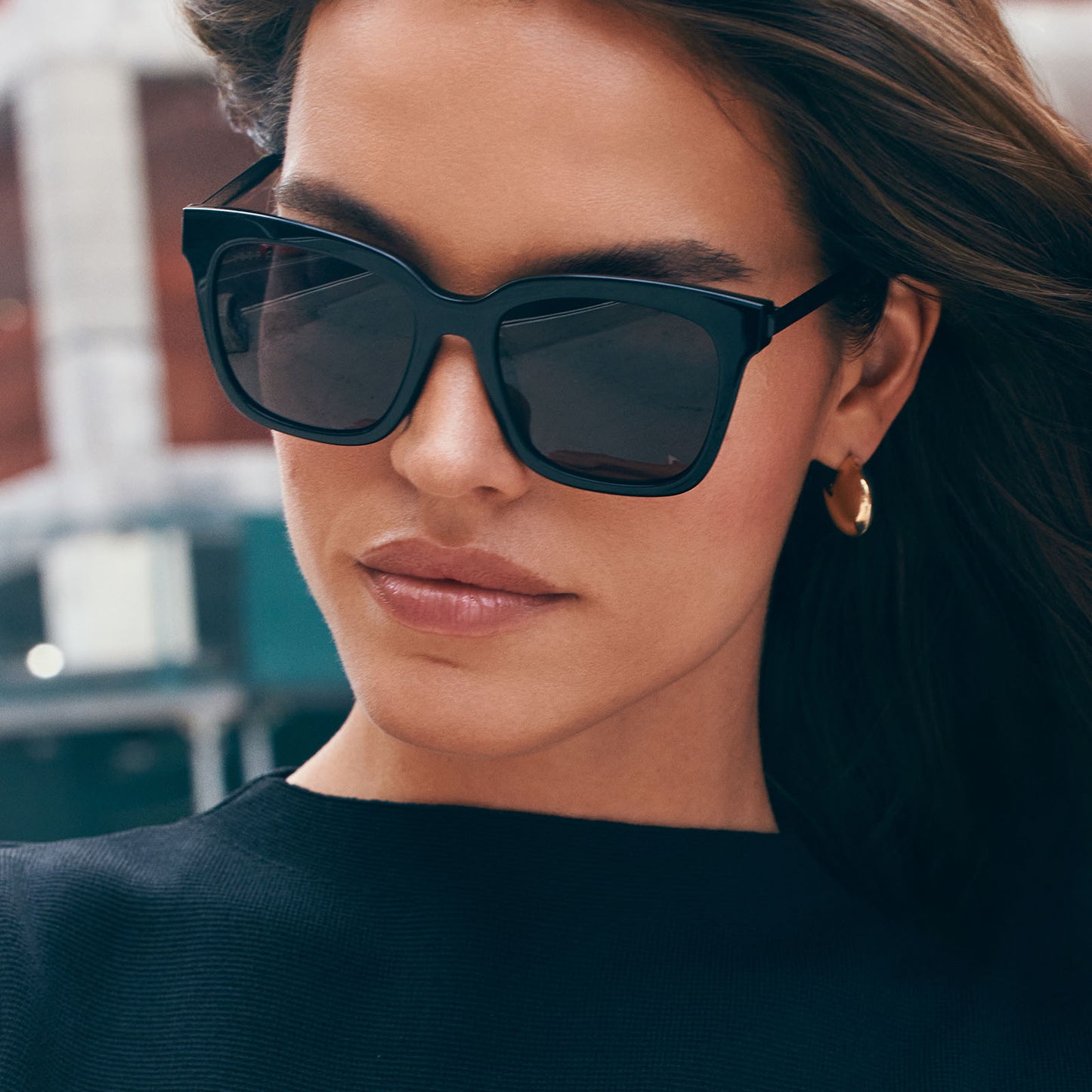 on model - female wearing diff eyewear bella black frame grey polarized lenses sunglasses front view