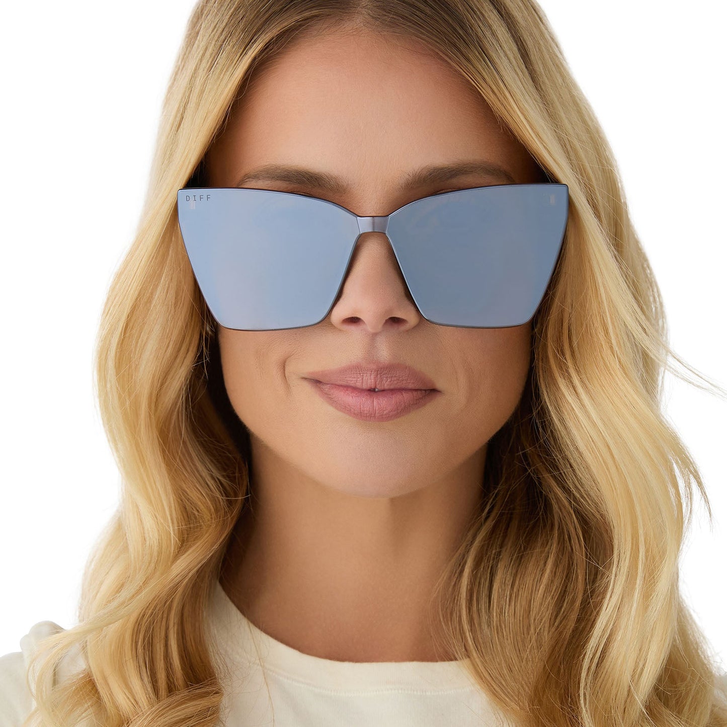 on model - female wearing diff eyewear featuring the goldie cateye sunglasses with a sequoia tortoise frame and brown gold flash lenses front view