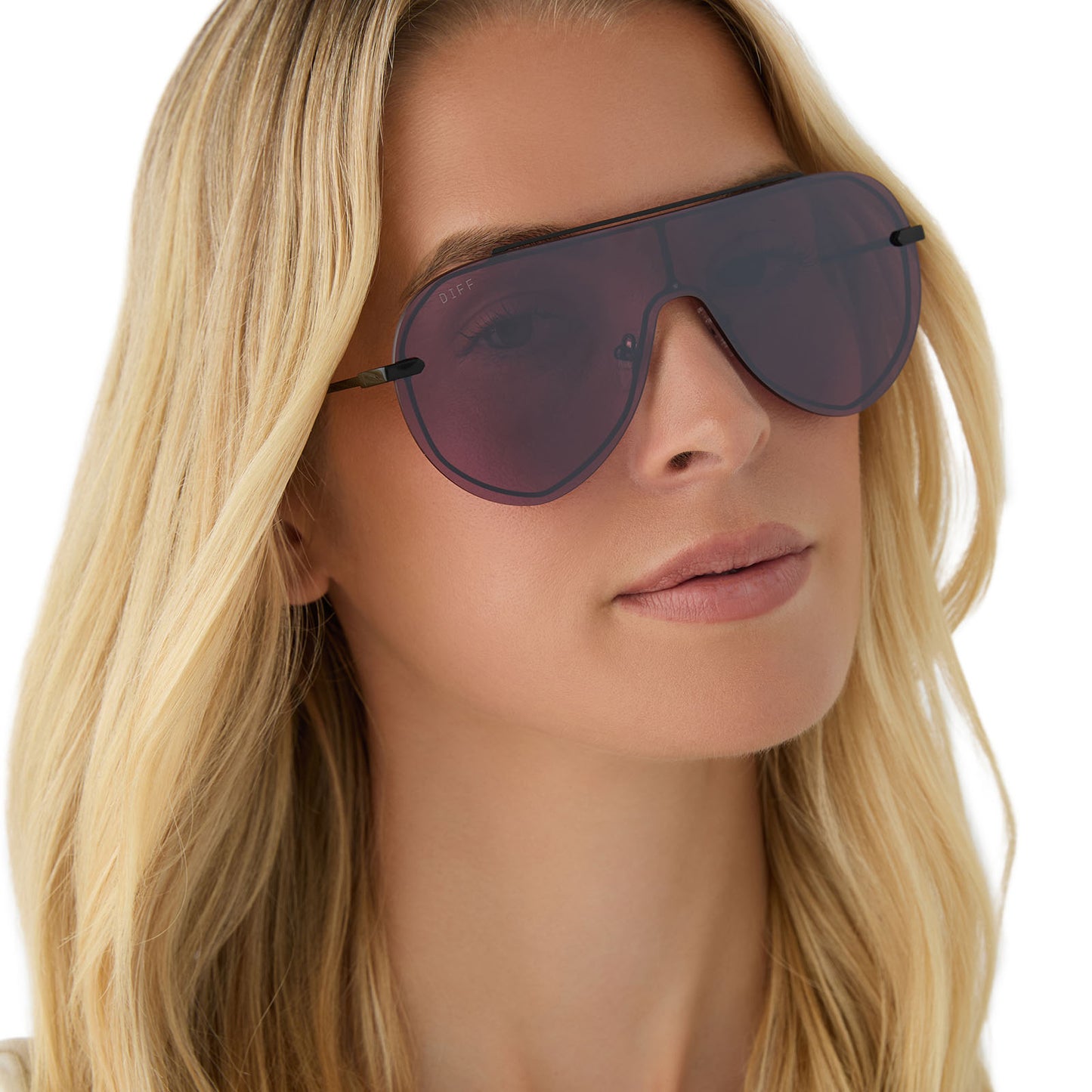 on model - female wearing diff eyewear featuring the imani shield sunglasses with a black frame and aubergine with silver flash lenses front view