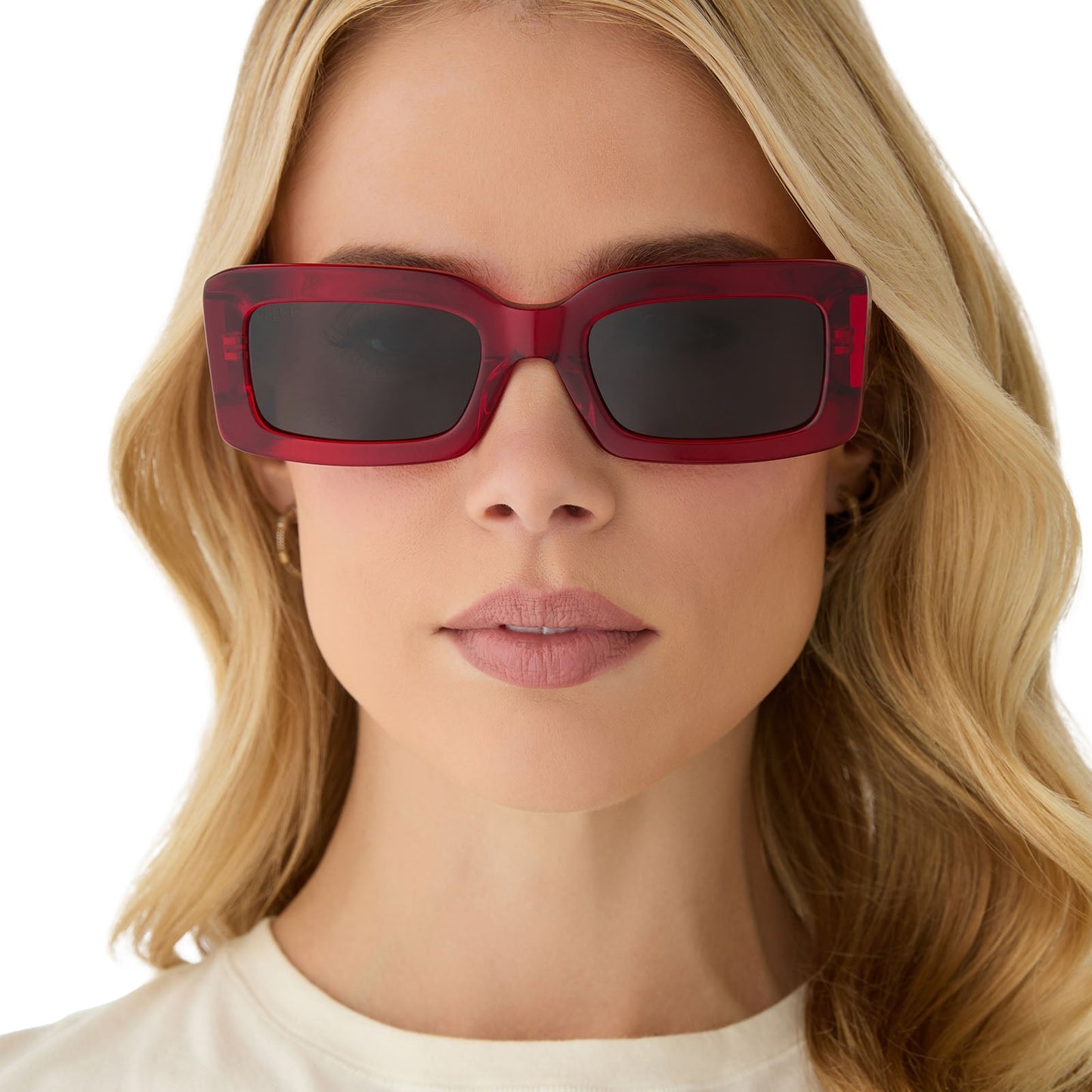 on model - female wearing diff eyewear featuring the indy rectangle sunglasses with a red hot summer frame and grey polarized lenses front view
