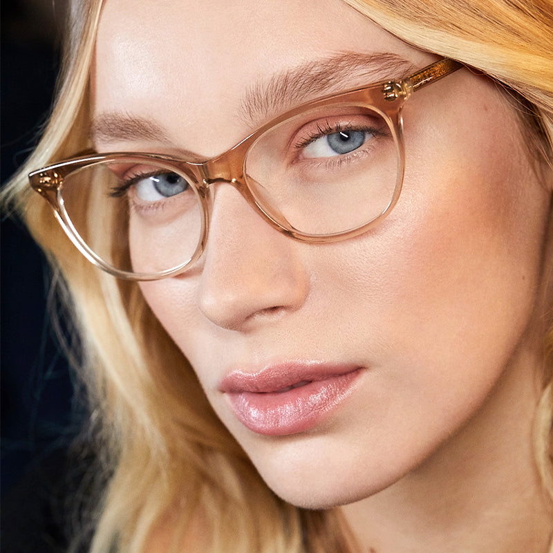 lifestyle - blonde wearing jade vintage crystal blue light tech glasses