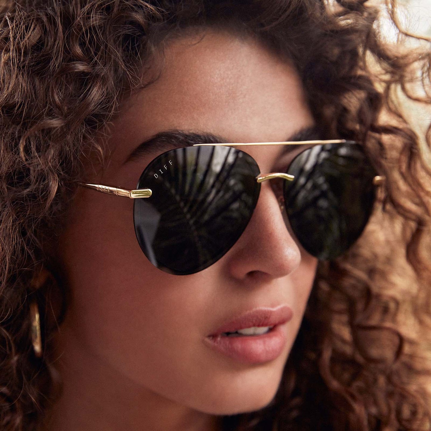Lenox sunglasses in gold frames with blue gradient polarized lens