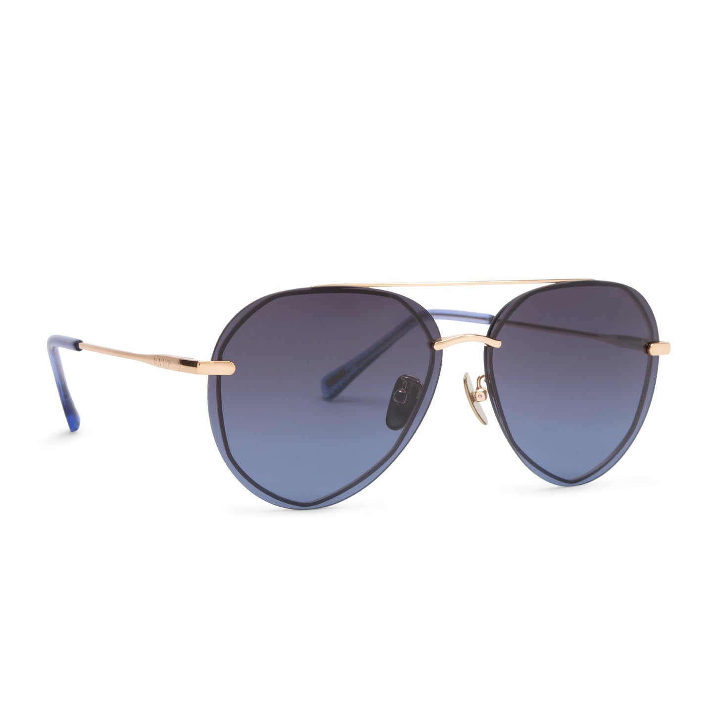 diff eyewear lenox aviator sunglasses with a gold metal frame and blue gradient polarized lenses angled view