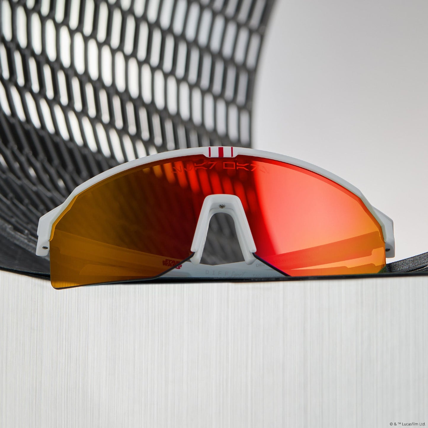 lifestyle - star warsâ„¢ x diff sport featuring the luke x-wingâ„¢ 2.0 shield sunglasses with a white frame and red orange fire mirror polarized lenses front view