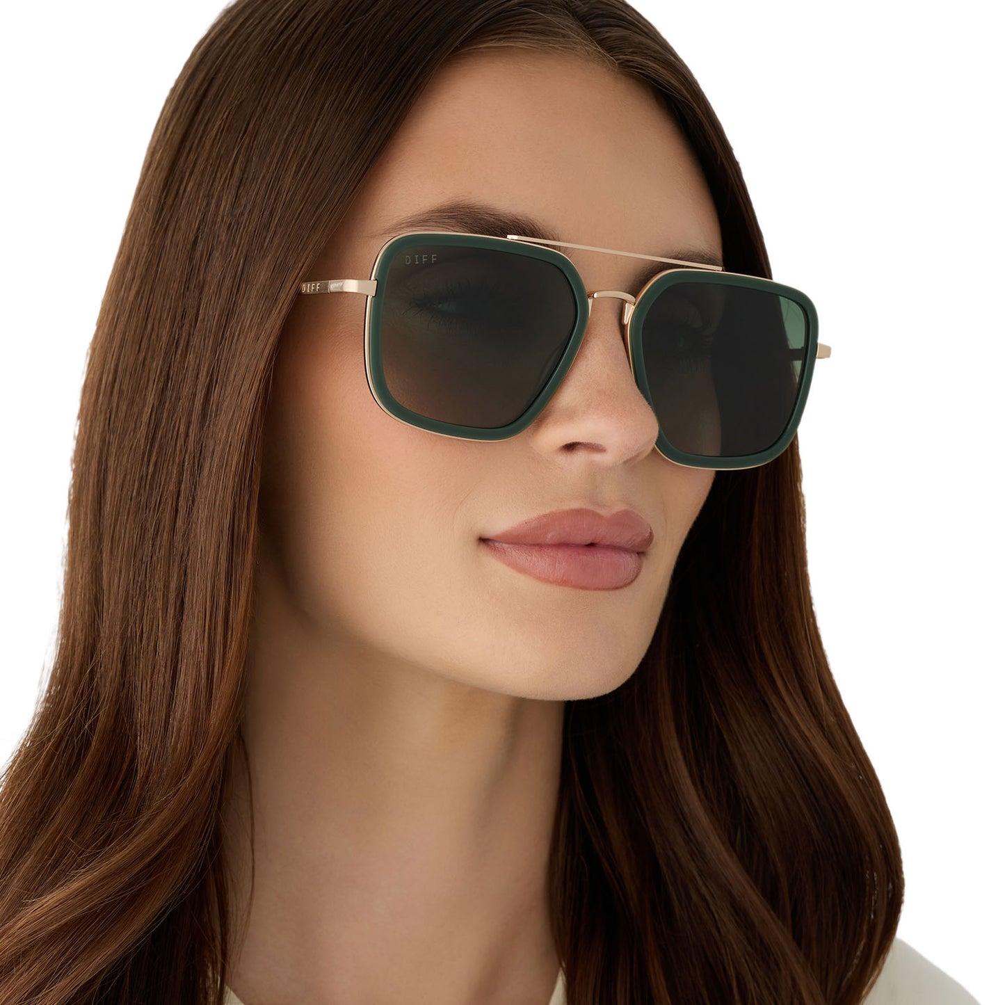 on model - female wearing diff eyewear featuring the jordan navigator sunglasses with a fairway green and gold metal frame with aloe green gradient polarized lenses angled view