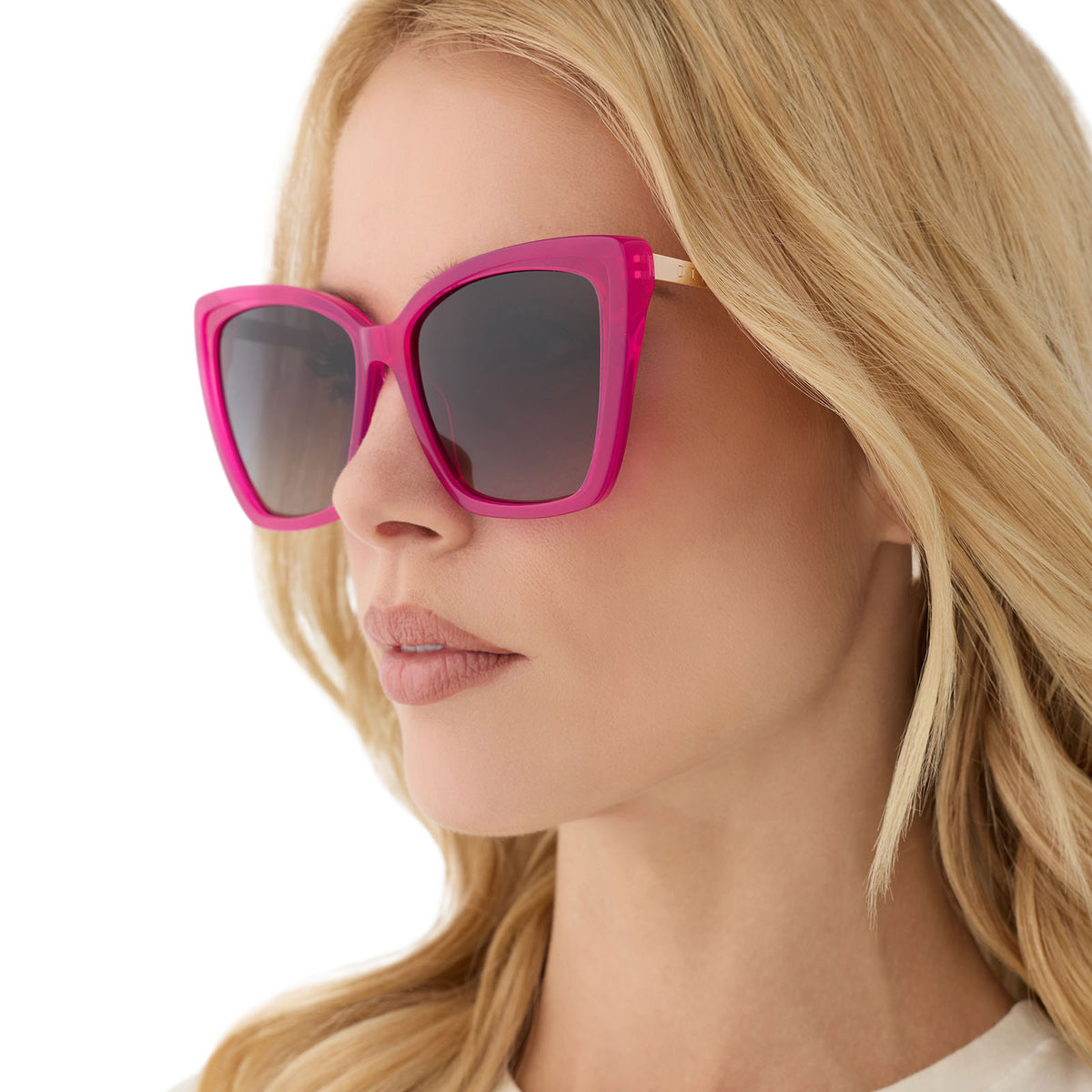 on model - blonde female wearing diff eyewear featuring the becky ii cat eye sunglasses with a bright pink tulip & gold frame and grey gradient polarized lenses angled view