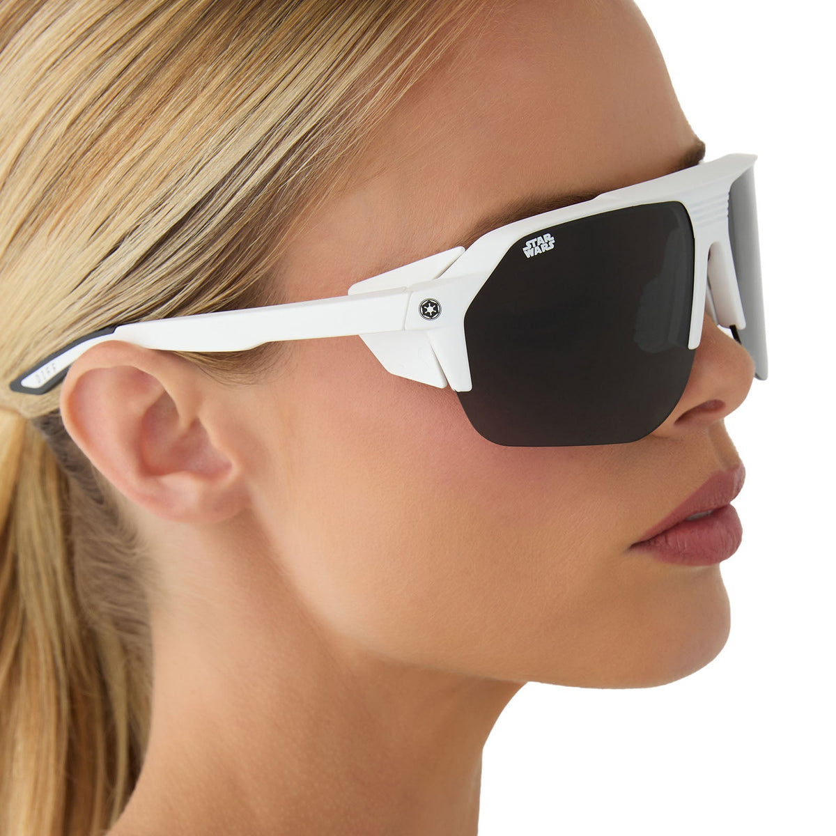 on model - female wearing star warsâ„¢ x diff sport featuring thestormtrooper square sunglasses with a galactic white frame and category 3 dark grey polarized lenses side view