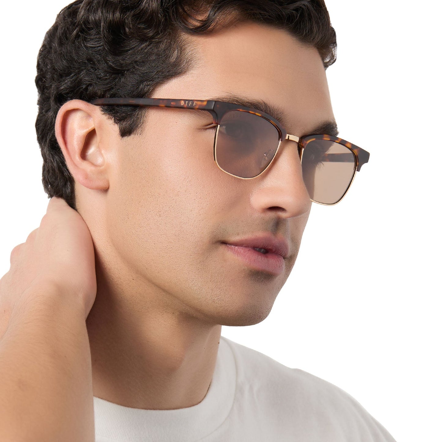on model - male wearing diff eyewear biarritz square sunglasses with a rich tortoise/gold frame and brown polarized lenses angled view