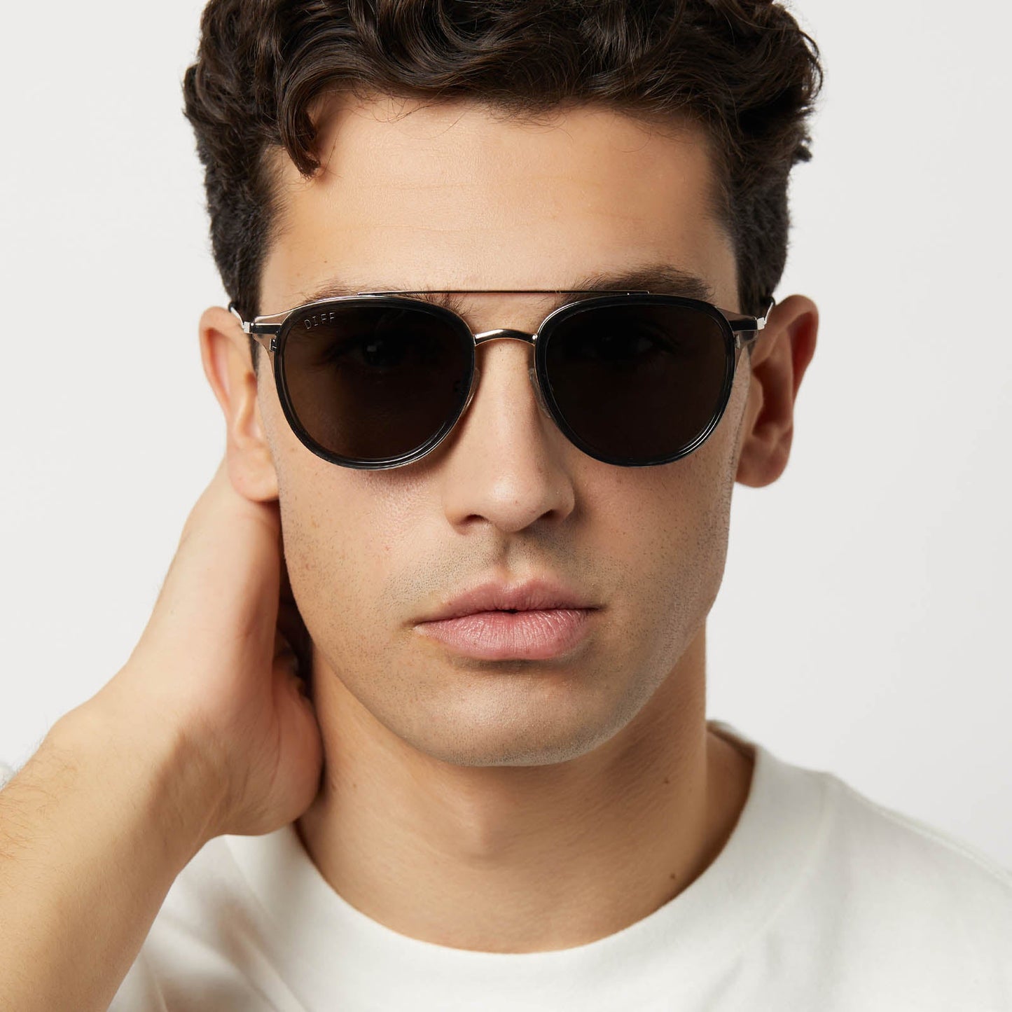 on model - male wearing diff eyewear featuring the camden aviator sunglasses with a black smoke crystal frame and grey polarized lenses front view