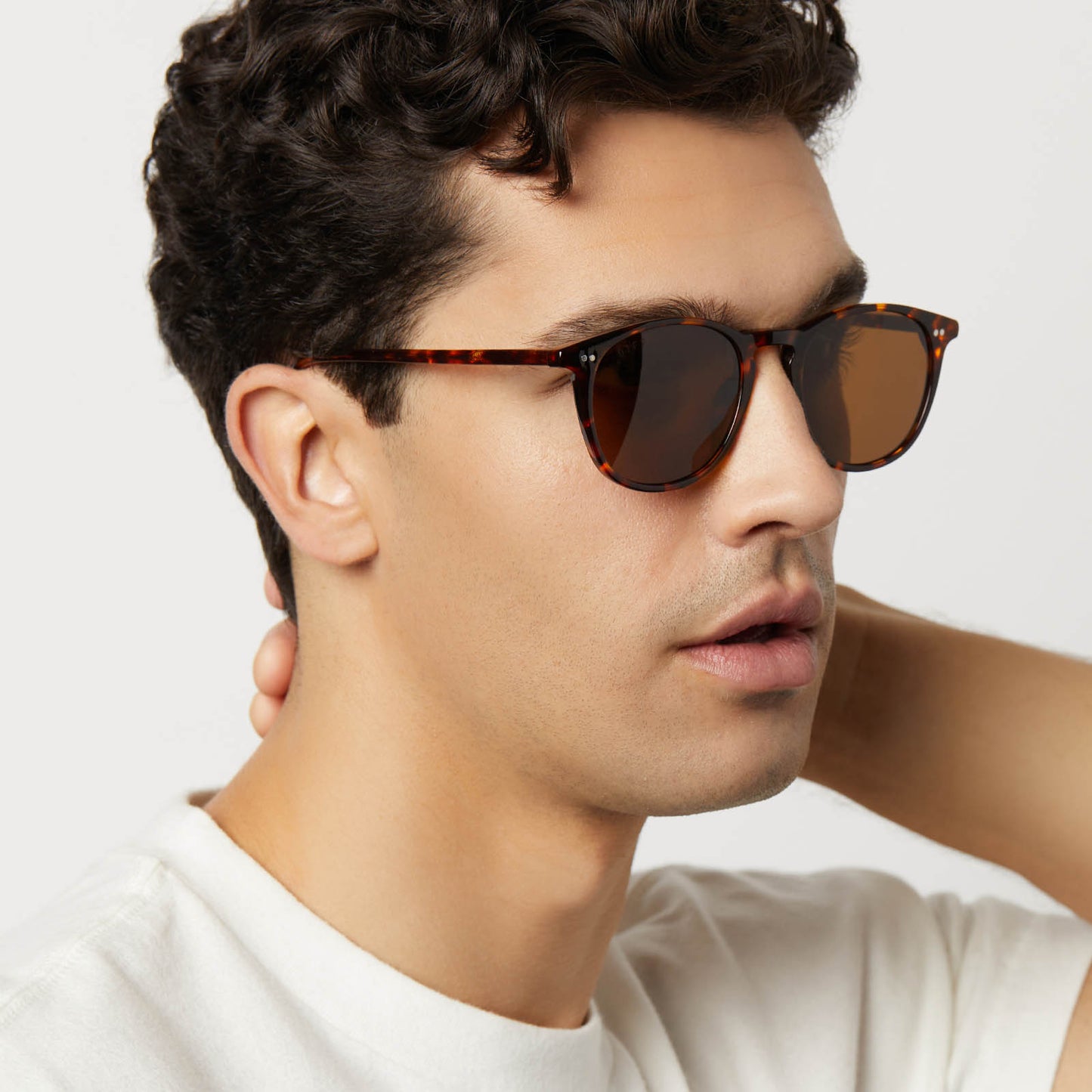 on model - male wearing diff eyewear featuring the jaxson xl square sunglasses with a rich tortoise frame and brown polarized lenses side view