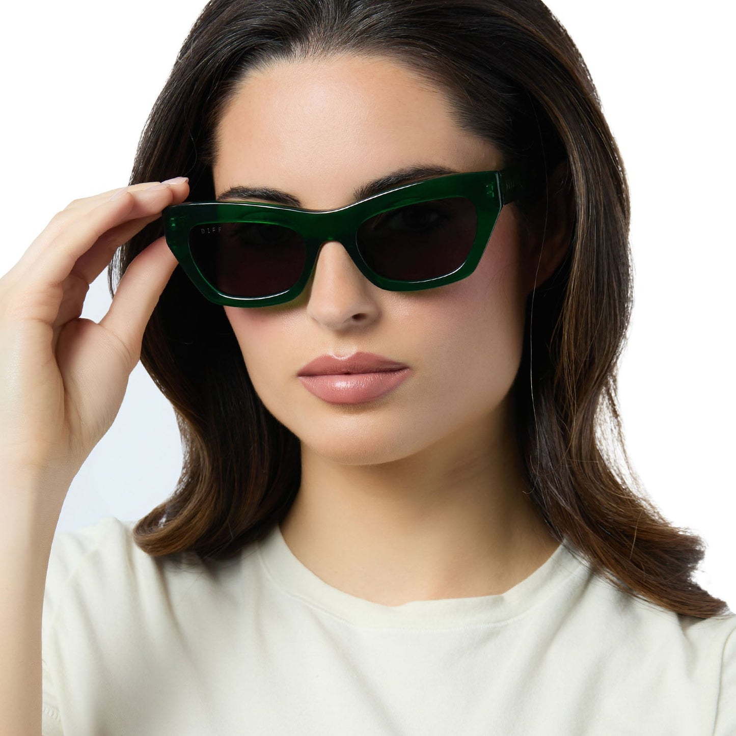 on model - female wearing diff eyewear katarina cat eye sunglasses with a palm green crystal acetate frame and grey lenses front view