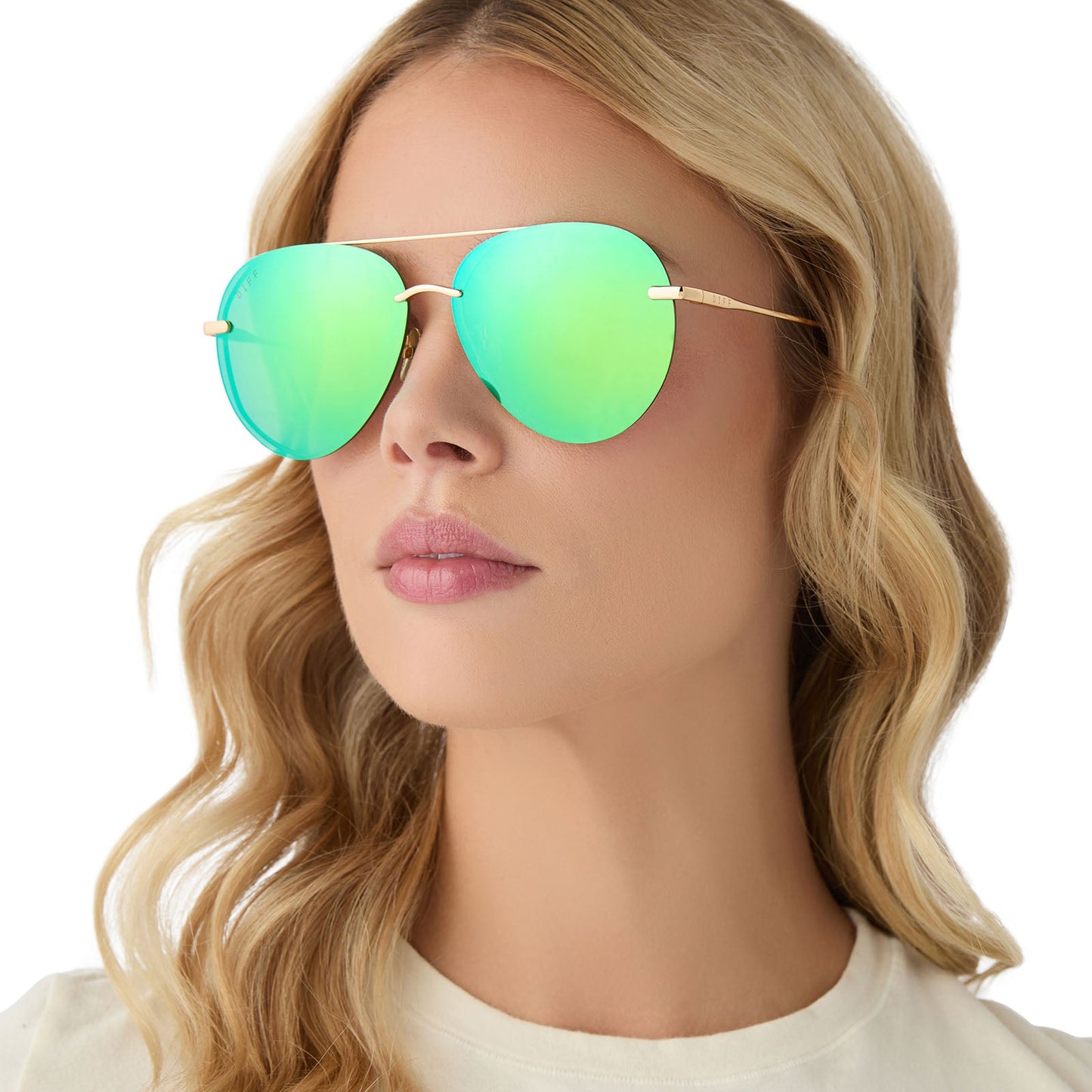 on model - female wearing diff eyewear lenox aviator sunglasses with a gold metal frame, green temple tips and green mirror polarized lenses side view