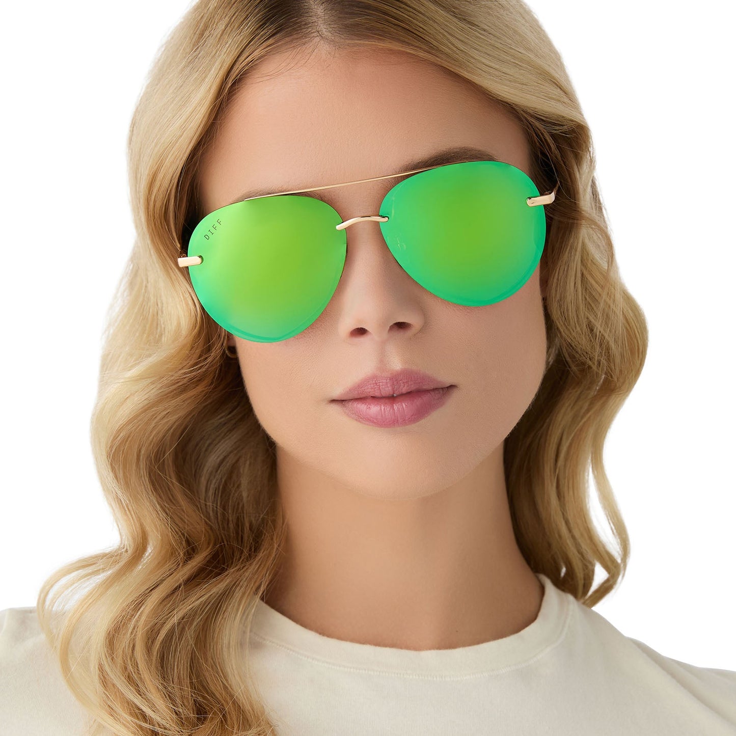 on model - female wearing diff eyewear lenox aviator sunglasses with a gold metal frame, green temple tips and green mirror polarized lenses front view