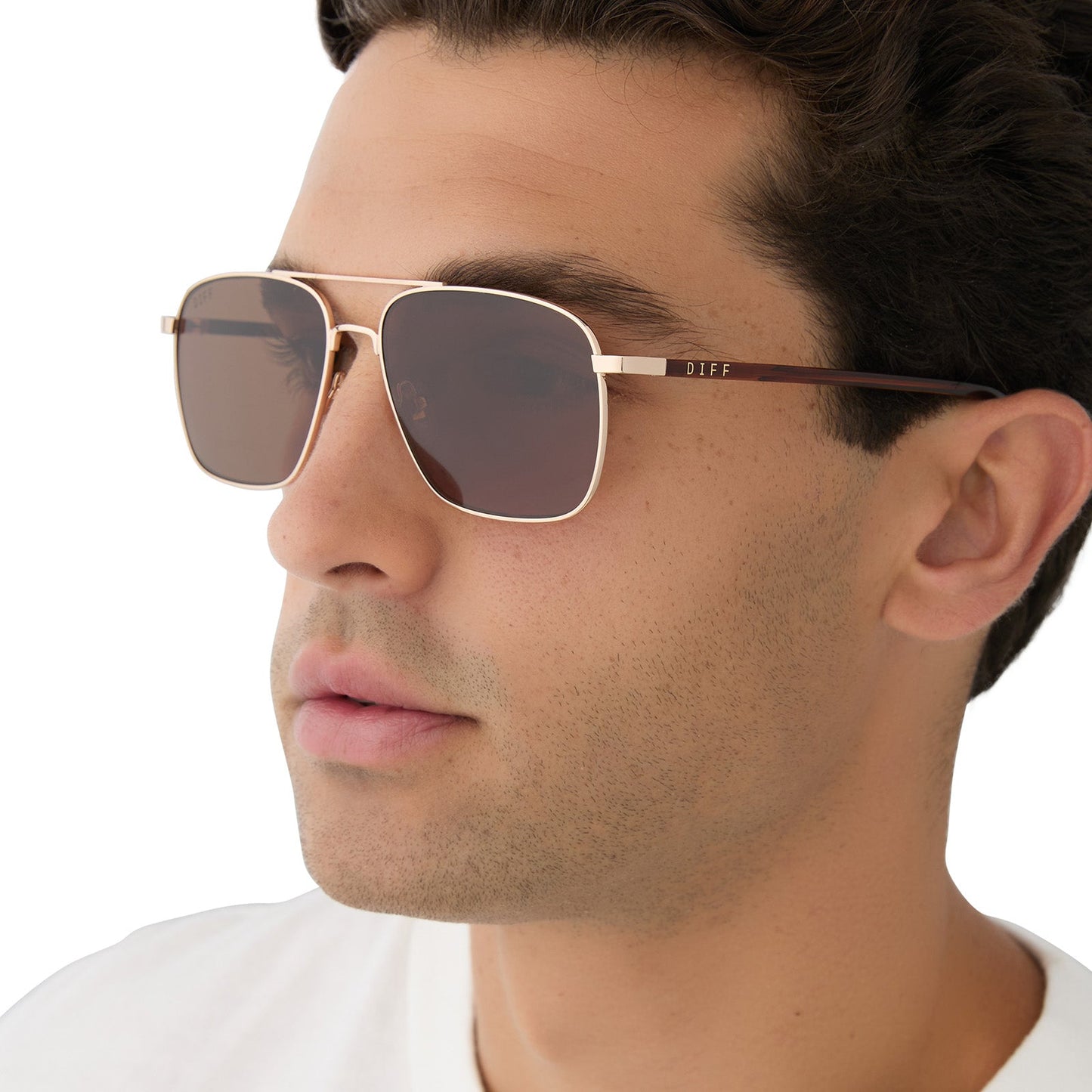 on model - male wearing diff eyewear yellowstone rip wheeler sunglasses gold & brown angled view
