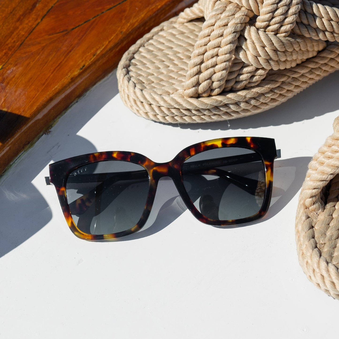 BELLA - AMBER TORTOISE + STEEL GRADIENT + POLARIZED flatlay