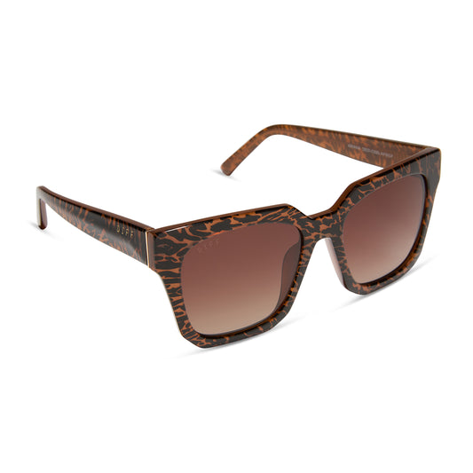 diff eyewear ariana square sunglasses with a animal print frame and brown gradient lenses angled view