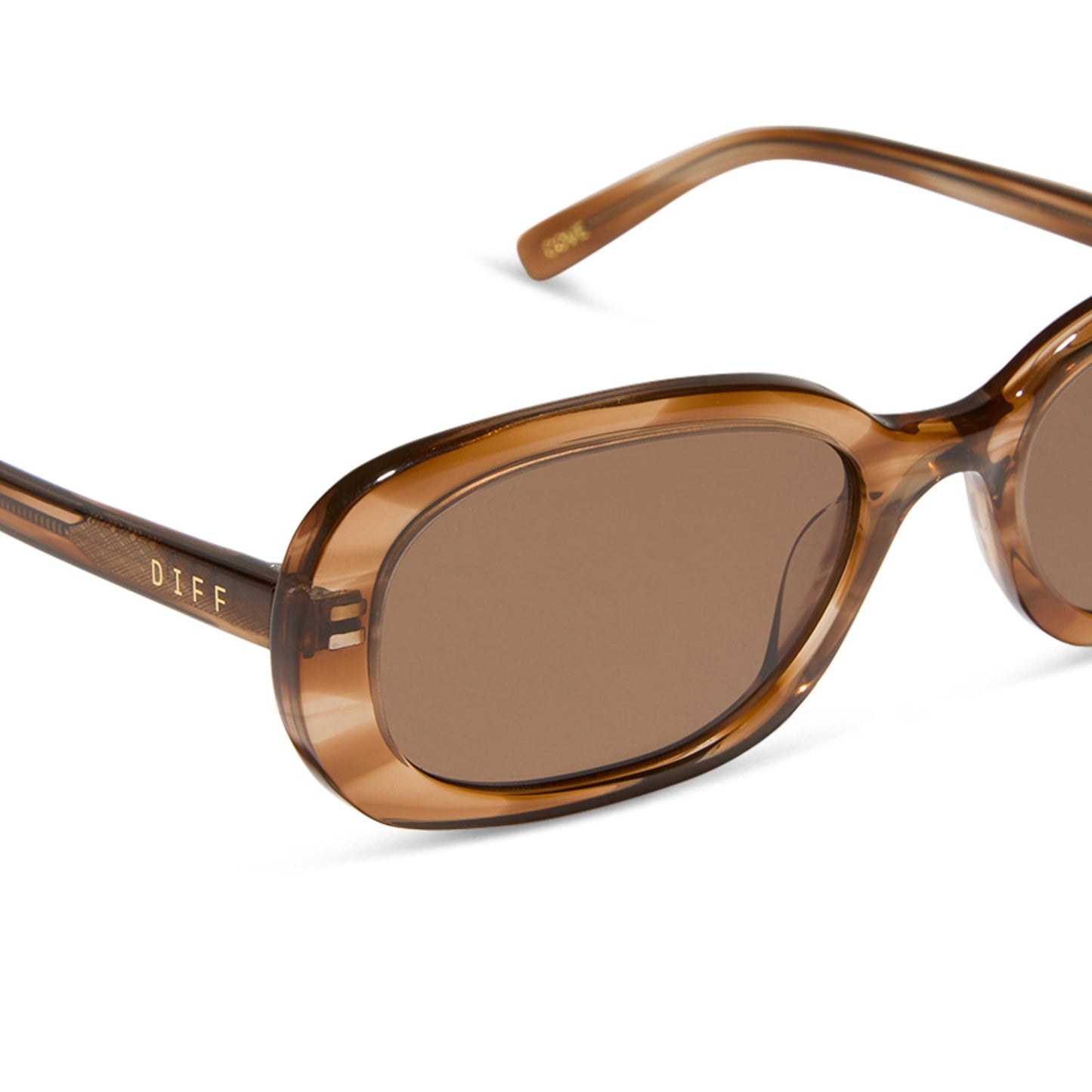 aspyn ovard x diff eyewear featuring the cove oval sunglasses with a tortoise frame and brown lenses detailed view
