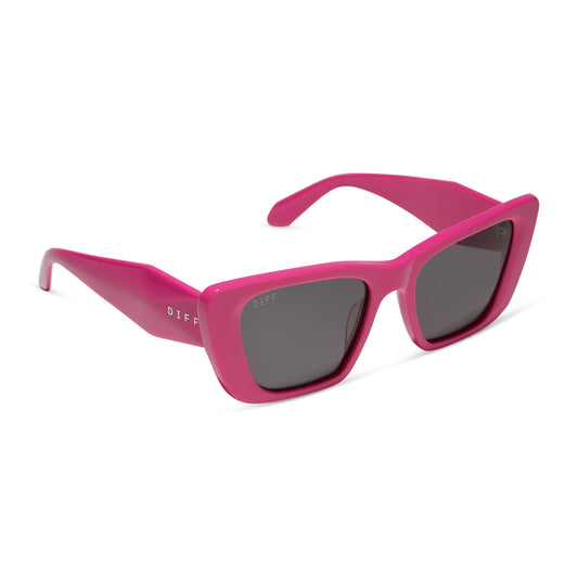 diff eyewear featuring the aura square sunglasses with a bright pink frame and grey lenses angled view