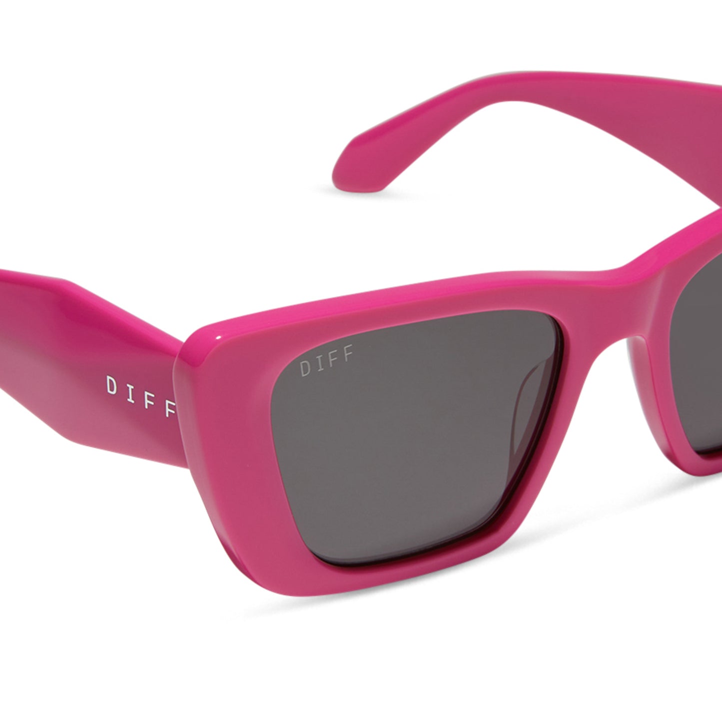 diff eyewear featuring the aura square sunglasses with a bright pink frame and grey lenses detailed view