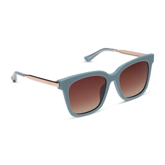 diff eyewear bella square oversized sunglasses with a dew drop blue frame, gold temples and brown gradient lenses angled view