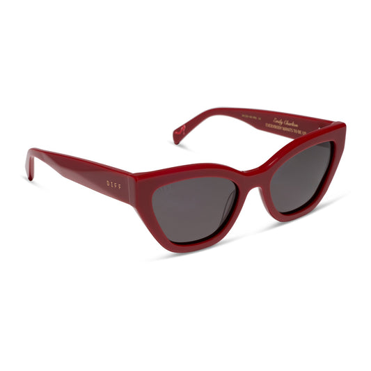 the devil wears prada x diff eyewear featuring the emily cat eye sunglasses with a red acetate frame and grey polarized lenses angled view