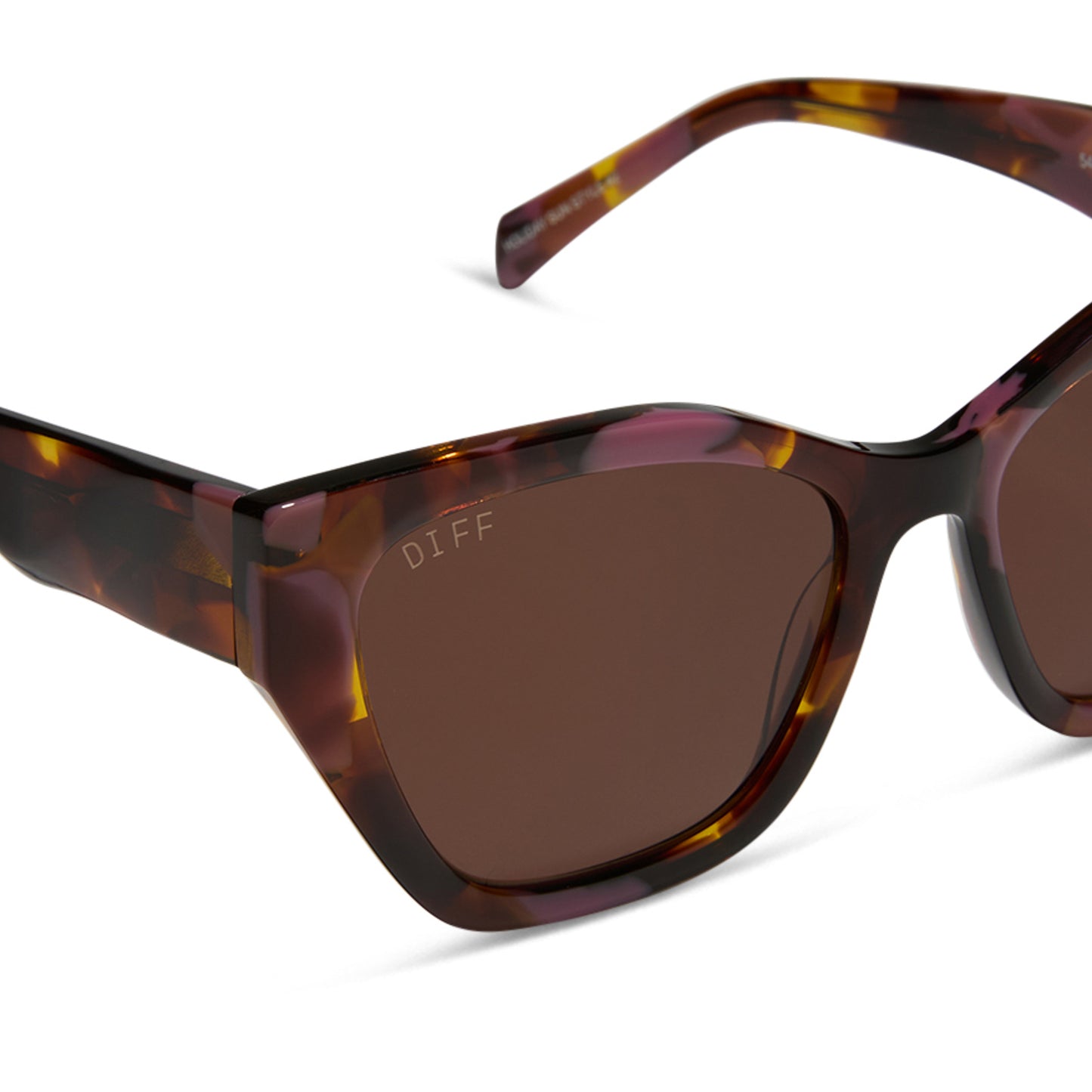 diff eyewear featuring the evie cat eye sunglasses with a torino tortoise frame and brown lenses detailed view