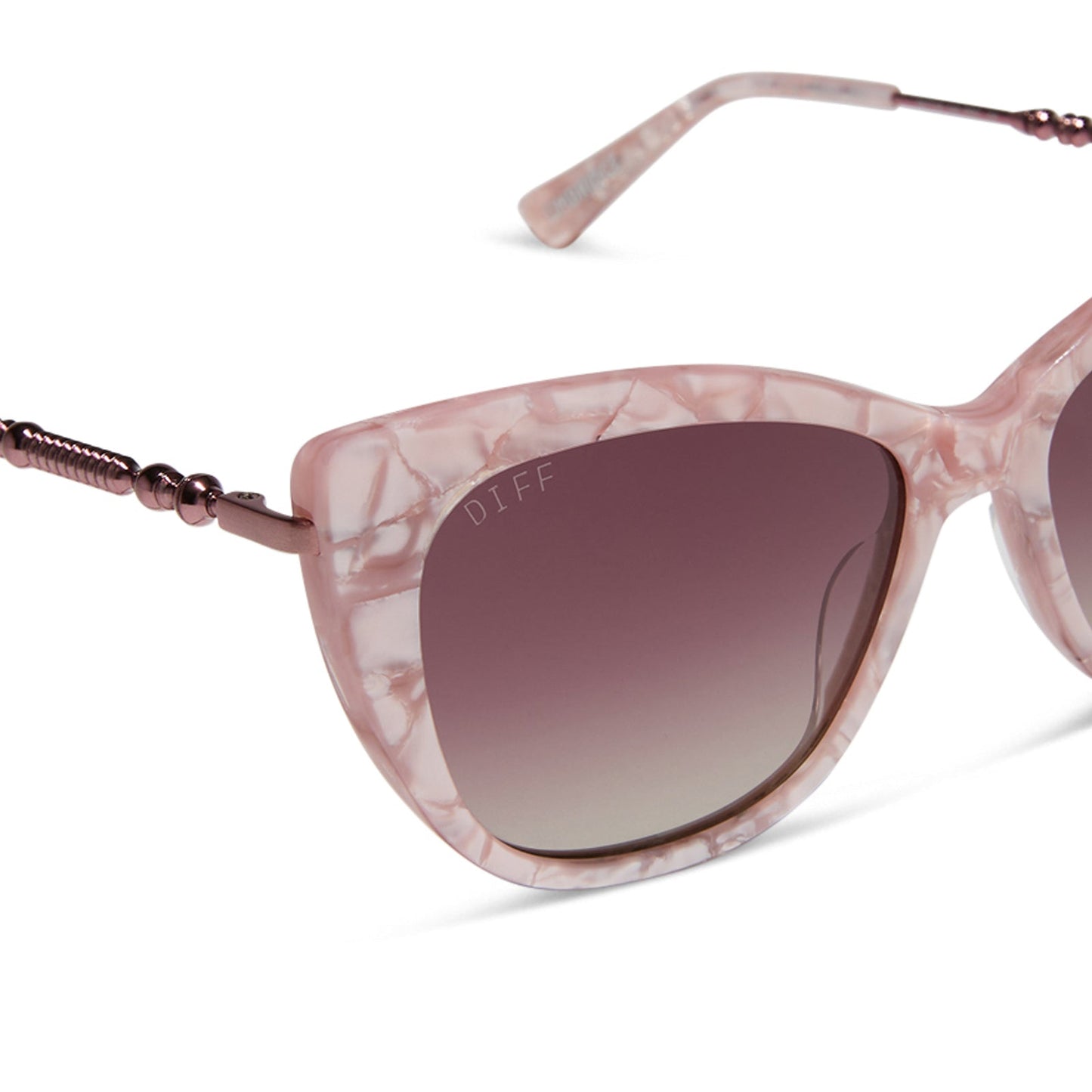 harry potter x diff eyewear featuring professor umbridge cat eye sunglasses with a pink mother of pearl frame and wine gradient lenses detailed view