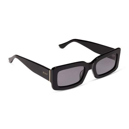 diff eyewear indy rectangular sunglasses with a black acetate frame and grey polarized lenses angled view